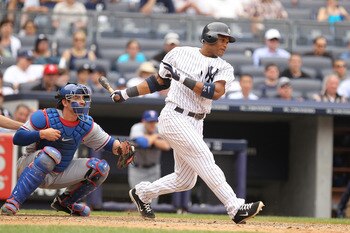 NEW YORK, NY - JUNE 16:  Robinson Cano #24 of the New York Yankees in action against the Texas Rangers  during their game on June 16, 2011 at Yankee Stadium in the Bronx borough of New York City.  (Photo by Al Bello/Getty Images)