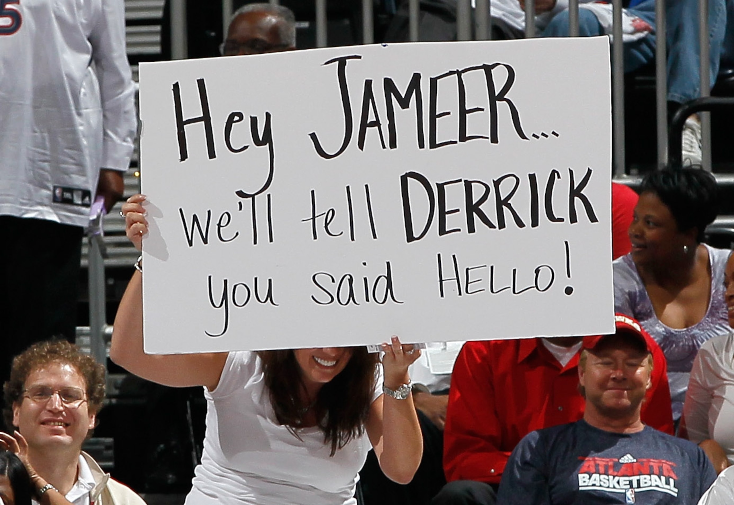 ATLANTA, GA - APRIL 28:  A fan of the Atlanta Hawks holds up a sign against the Orlando Magic during Game Six of the Eastern Conference Quarterfinals in the 2011 NBA Playoffs at Philips Arena on April 28, 2011 in Atlanta, Georgia.  NOTE TO USER: User expr