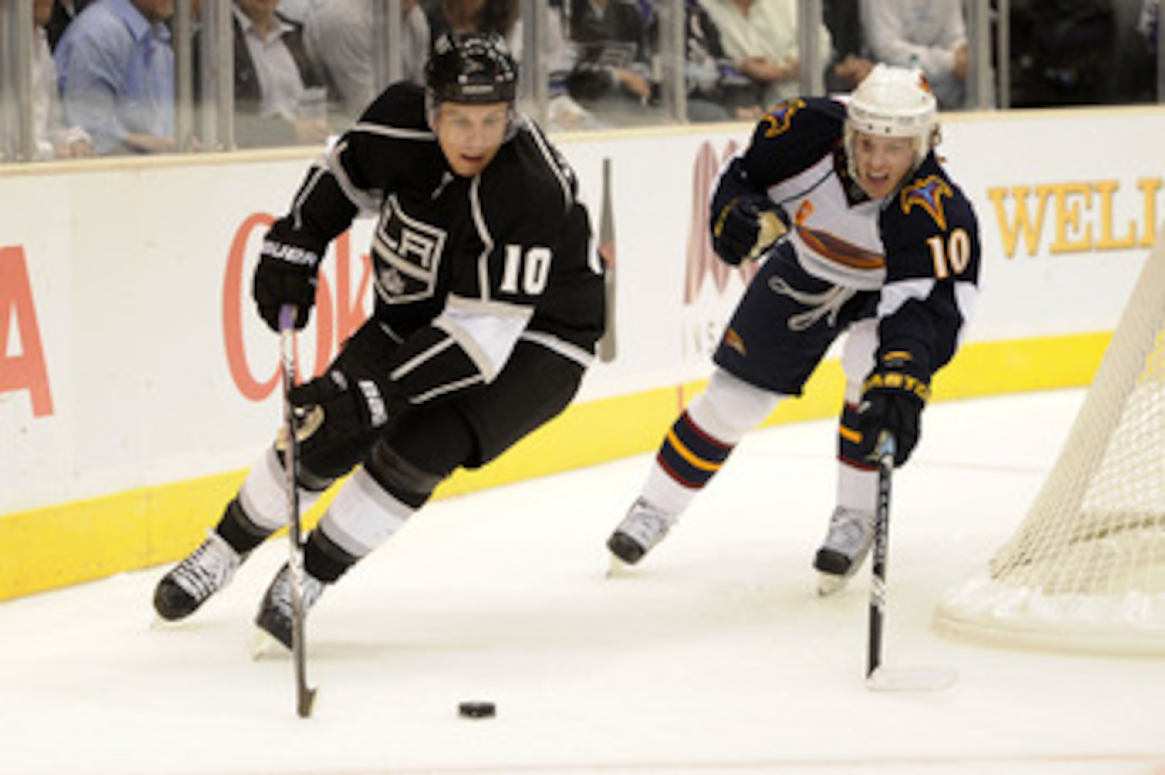 LOS ANGELES, CA - OCTOBER 12:  Brayden Schenn #10 of the Los Angeles Kings controls the puck against Bryan Little #10 of the Atlanta Thrashers during their game at Staples Center on October 12, 2010 in Los Angeles, California.  (Photo by Harry How/Getty I