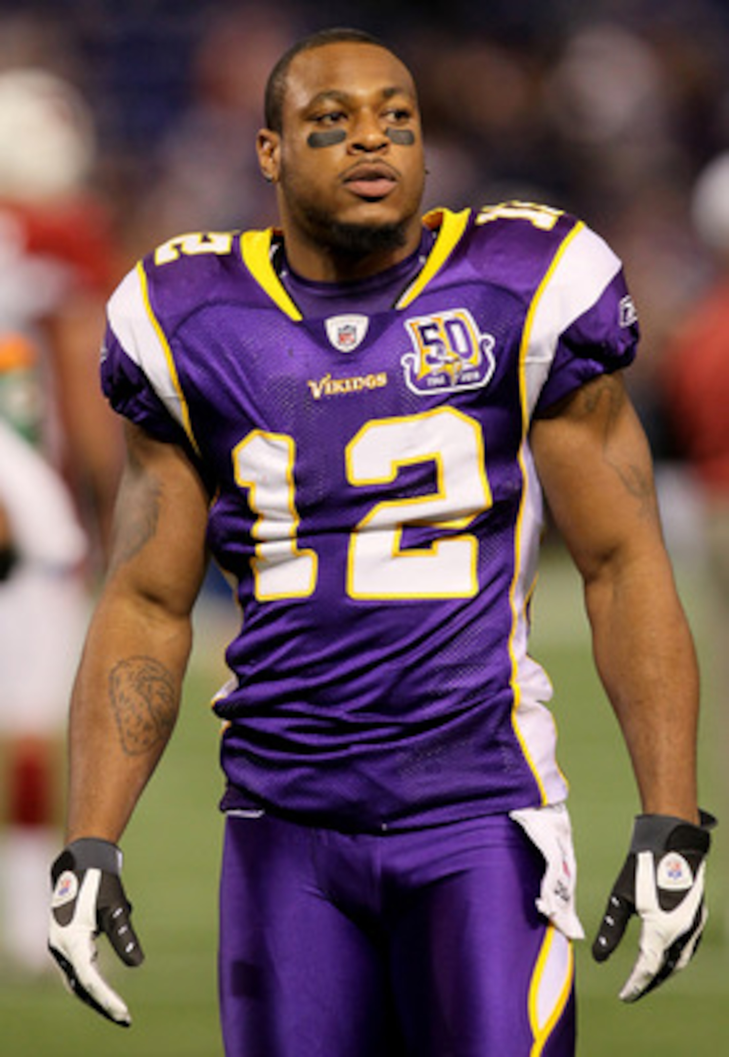 MINNEAPOLIS - NOVEMBER 7:  Wide receiver Percy Harvin #12 of the Minnesota Vikings gets ready for the game with the Arizona Cardinals at Hubert H. Humphrey Metrodome on November 7, 2010 in Minneapolis, Minnesota.  (Photo by Stephen Dunn/Getty Images)