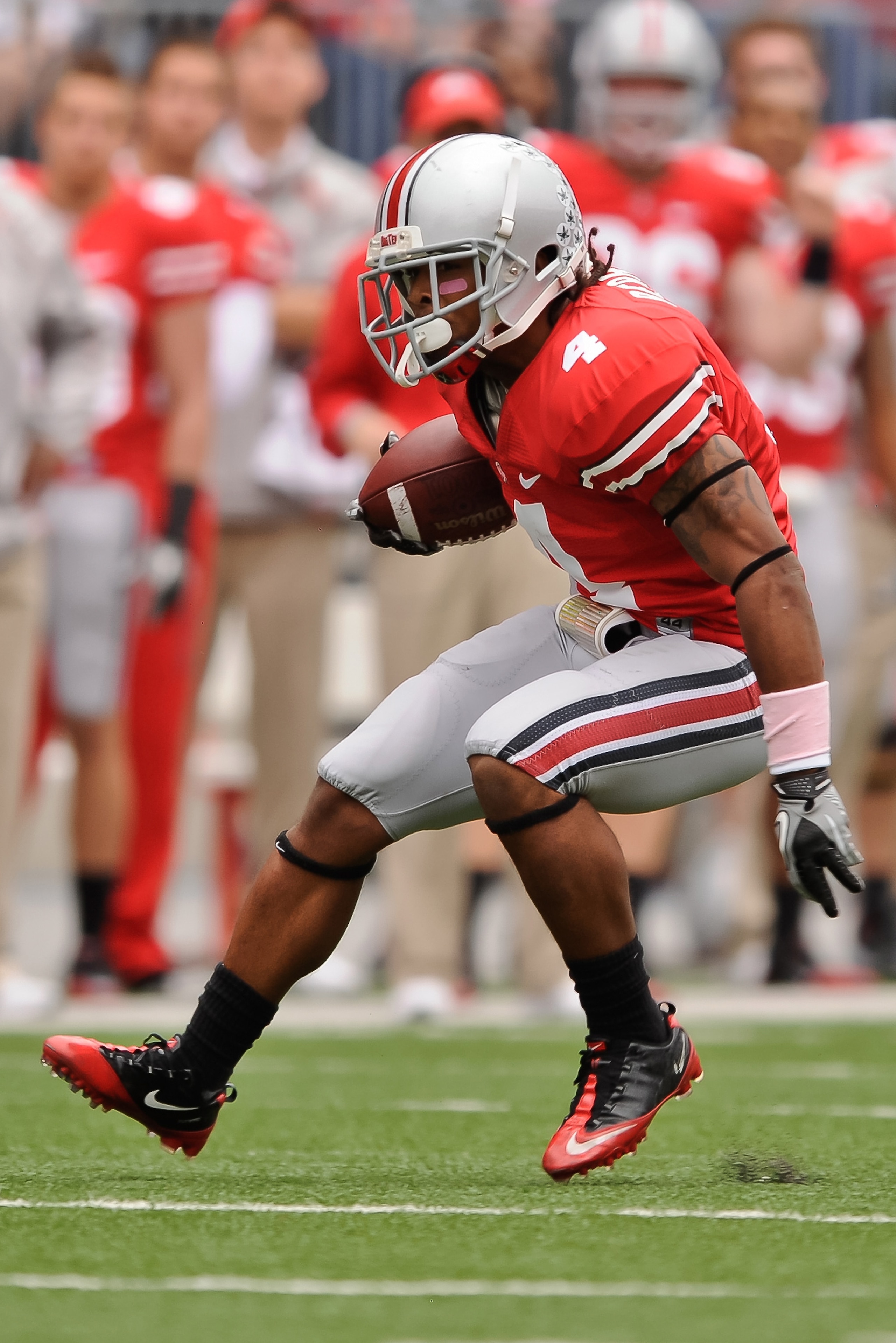 COLUMBUS, OH - OCTOBER 23:  Jaamal Berry #4 of the Ohio State Buckeyes runs with the ball against the Purdue Boilermakers at Ohio Stadium on October 23, 2010 in Columbus, Ohio.  (Photo by Jamie Sabau/Getty Images)
