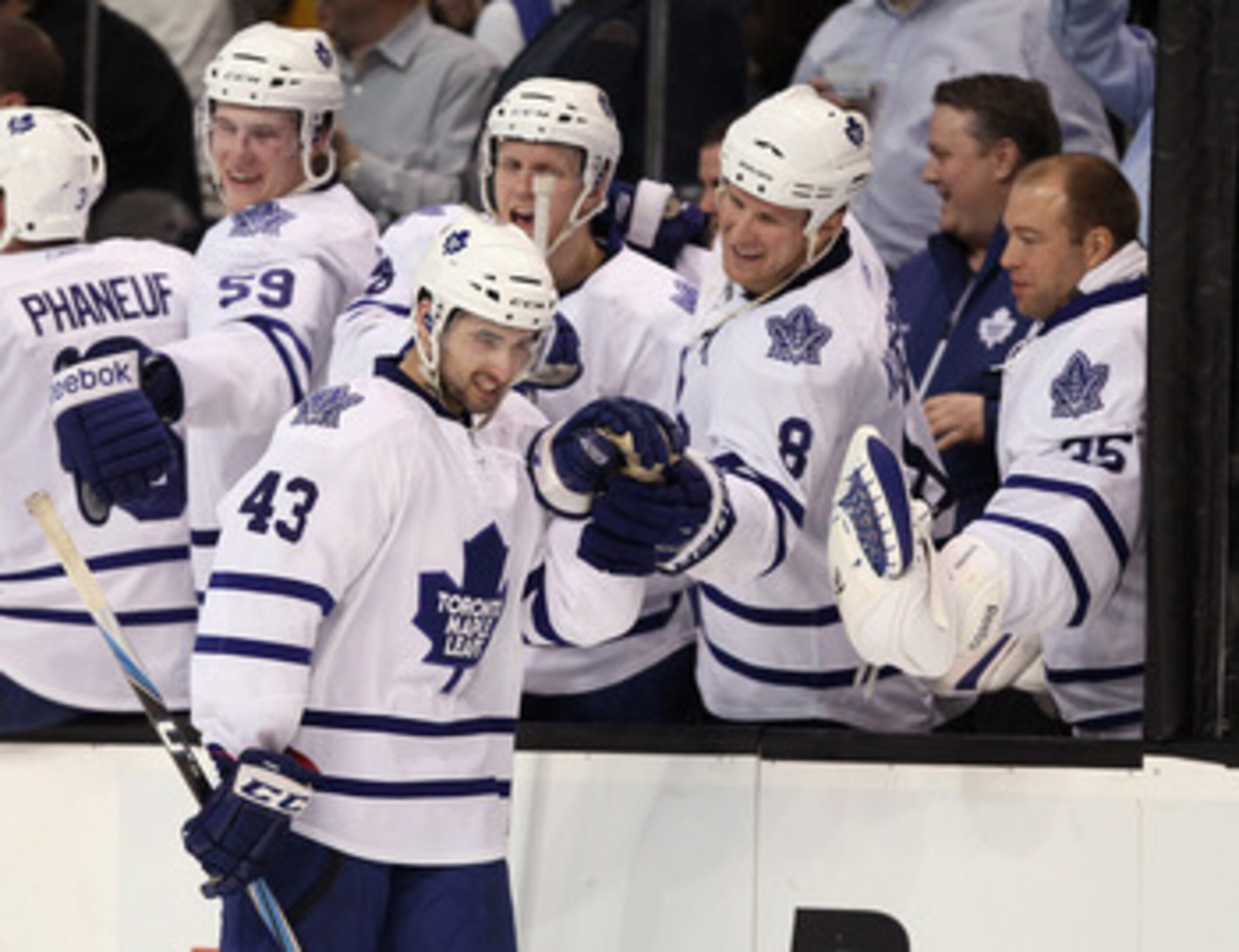 BOSTON, MA - MARCH 31:  Nazem Kadri #43 of the Toronto Maple Leafs is congratulated by teammtes on the bench after he scored the game winner in the overtime shootout against the Boston Bruins on March 31, 2011 at the TD Garden in Boston, Massachusetts. Th