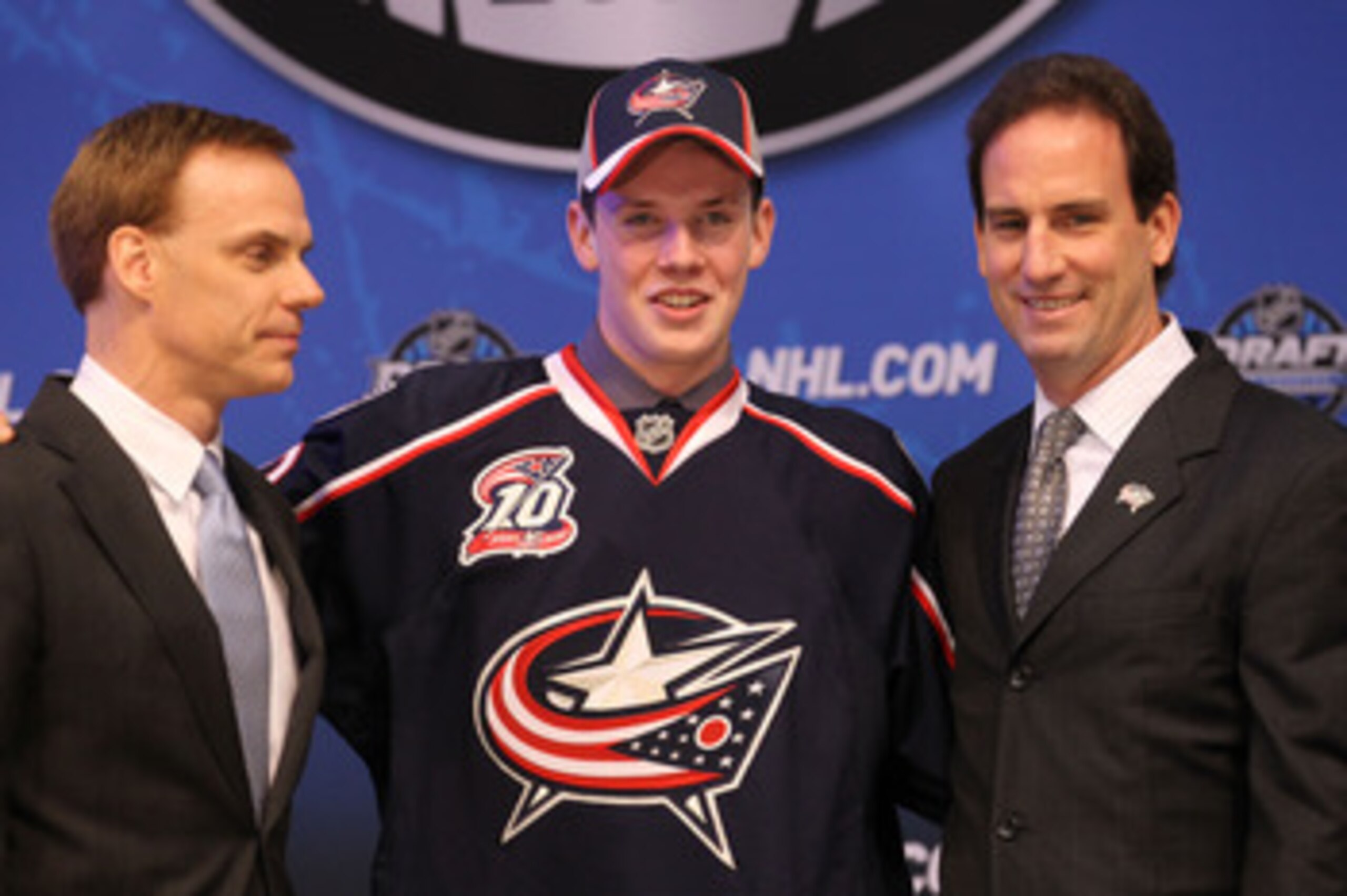 LOS ANGELES, CA - JUNE 25:  Ryan Johansen, drafted fourth overall by the Columbus Blue Jackets, poses on stage with team personnel during the 2010 NHL Entry Draft at Staples Center on June 25, 2010 in Los Angeles, California.  (Photo by Bruce Bennett/Gett