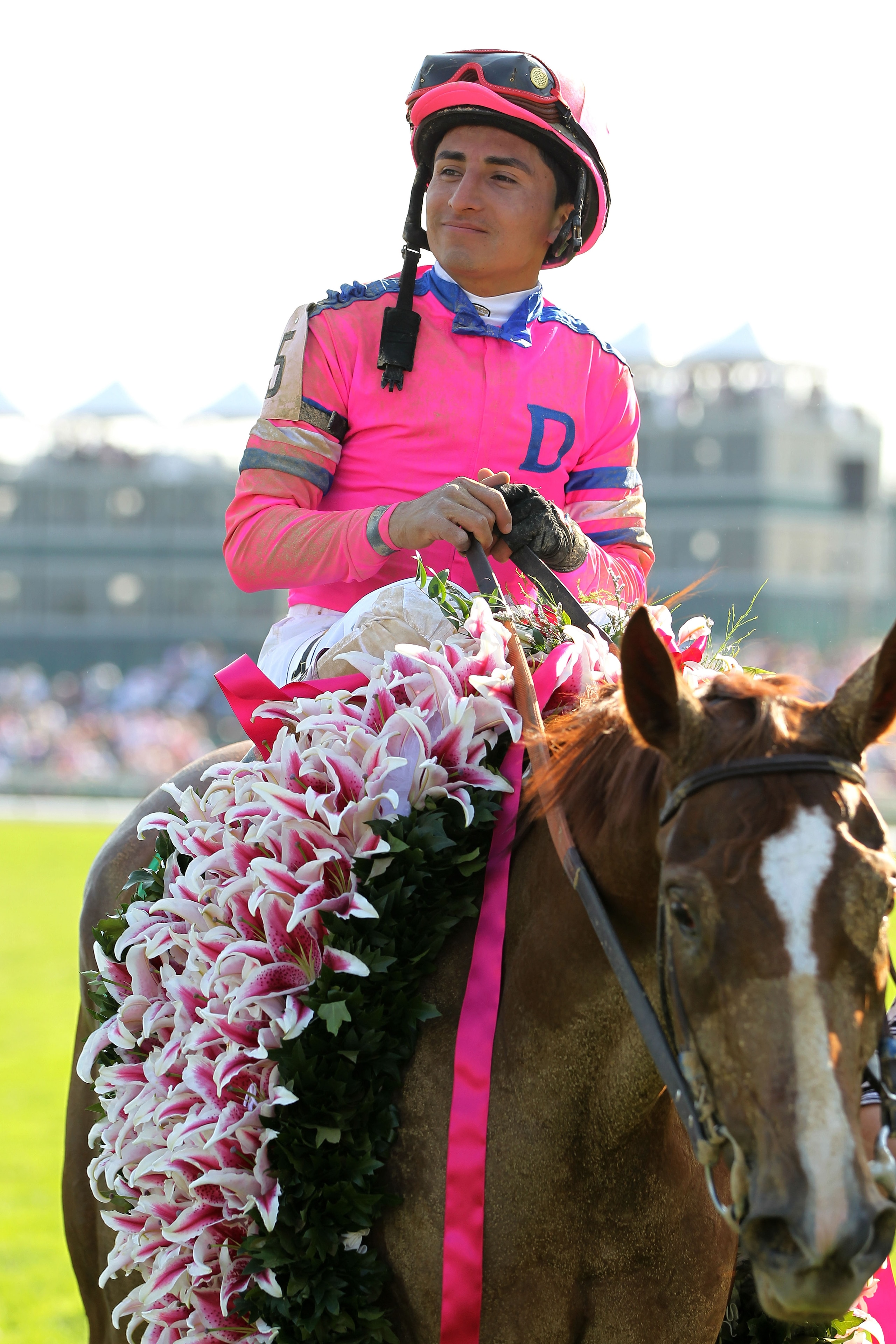 LOUISVILLE, KY - APRIL 30:  Rafael Bejarano atop Blind Luck celebrates after winning the 136th running of the Kentucky Oaks at Churchill Downs on April 30, 2010 in Louisville, Kentucky.  (Photo by Jamie Squire/Getty Images)