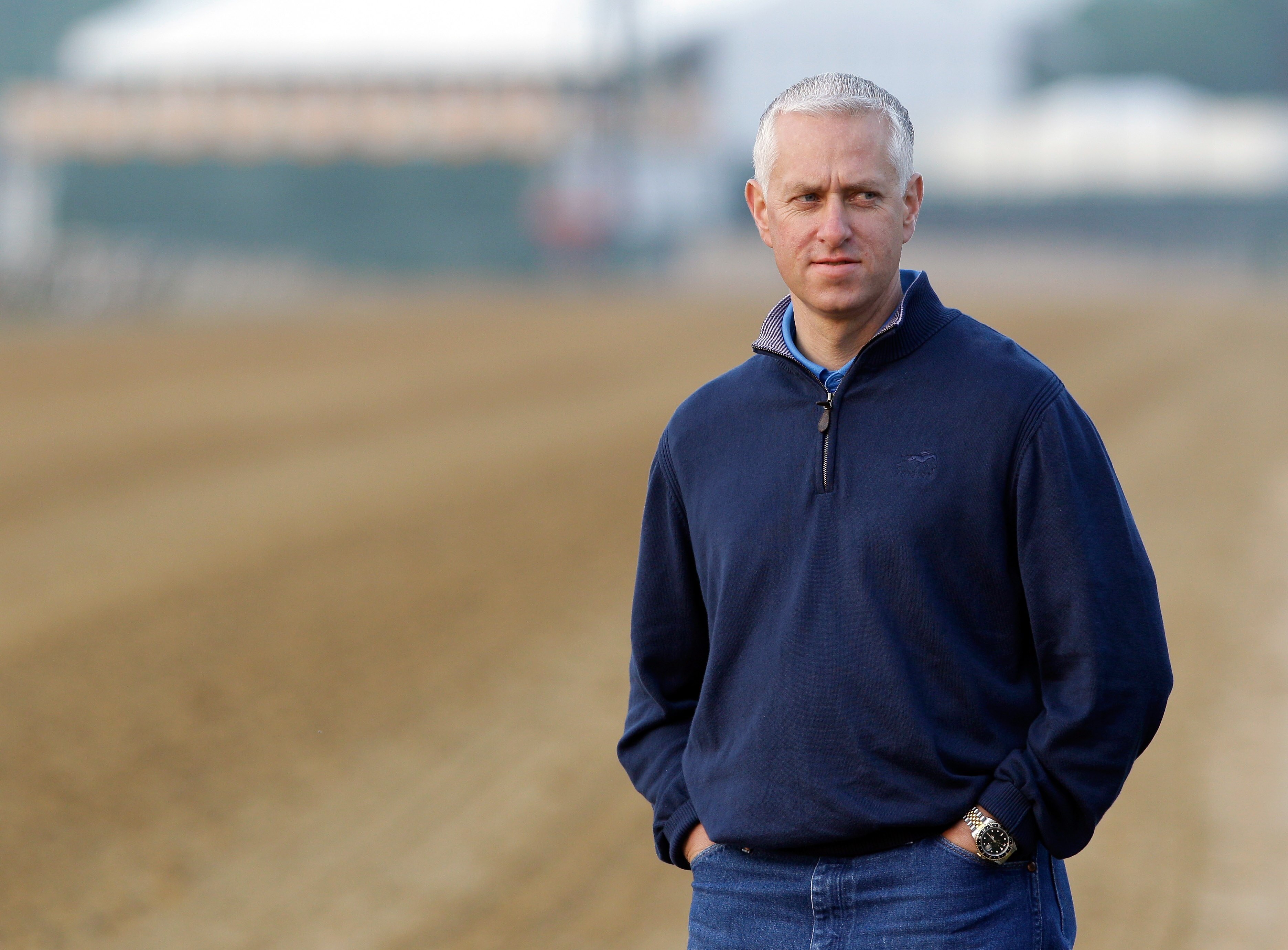 BALTIMORE, MD - MAY 20: Trainer Todd Pletcher watches his Preakness horse Dance City go over the track at Pimlico Race Course on May 20, 2011 in Baltimore, Maryland. The 136th running of the Preakness Stakes will take place on May 21. (Photo by Rob Carr/G