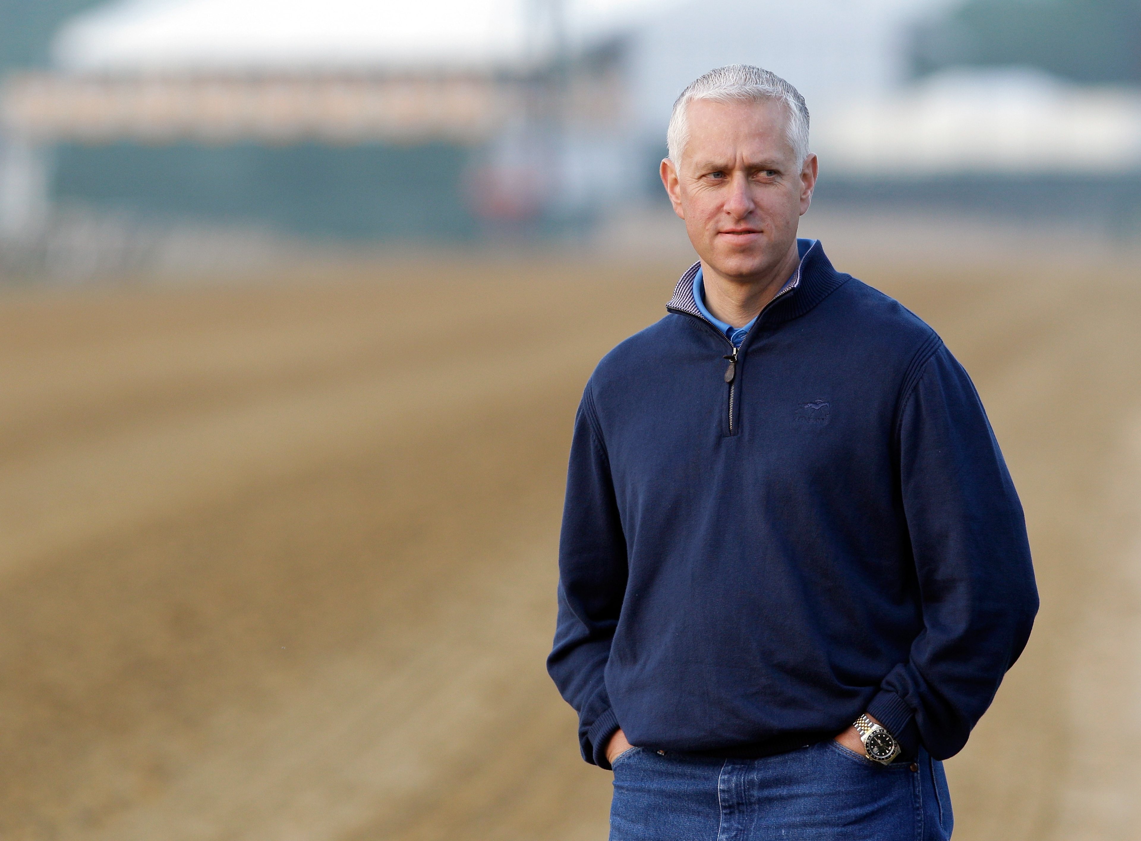BALTIMORE, MD - MAY 20: Trainer Todd Pletcher watches his Preakness horse Dance City go over the track at Pimlico Race Course on May 20, 2011 in Baltimore, Maryland. The 136th running of the Preakness Stakes will take place on May 21. (Photo by Rob Carr/G
