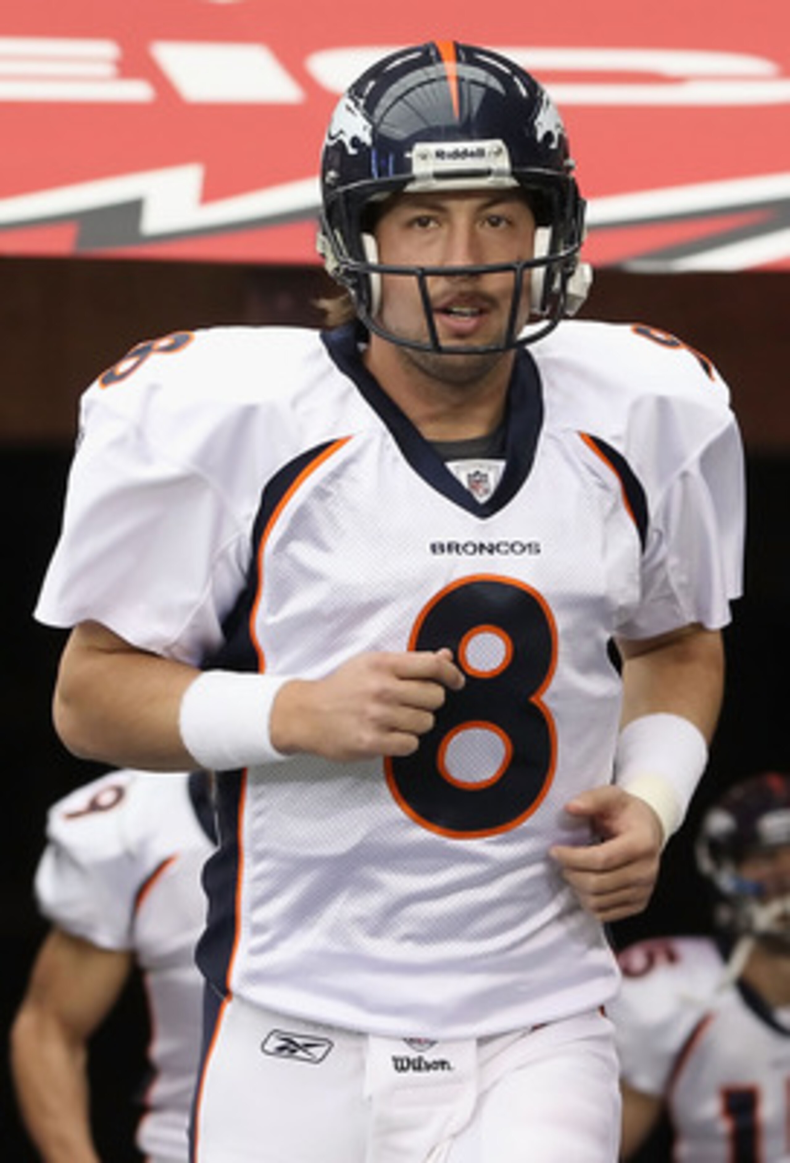 GLENDALE, AZ - DECEMBER 12:  Quarterback Kyle Orton #8 of the Denver Broncos runs out onto the field before the NFL game against the Arizona Cardinals at the University of Phoenix Stadium on December 12, 2010 in Glendale, Arizona.  The Cardinals defeated 