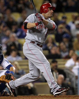 LOS ANGELES, CA - JUNE 14:  Joey Votto #19 of the Cincinnati Reds hits an RBI single to put the Reds ahead 2-1 in the eighth inning against the Los Angeles Dodgers on June 14, 2011 at Dodger Stadium in Los Angeles, California.  (Photo by Stephen Dunn/Gett