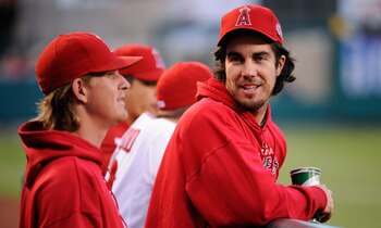 ANAHEIM, CA - MAY 25:  Pitchers Dan Harren #24 (R) and Jared Weaver #36 of the Los Angeles Angels of Anaheim during the baseball game against the Oakland Athletics at Angel Stadium of Anaheim on May 25, 2011 in Anaheim, California.  (Photo by Kevork Djans