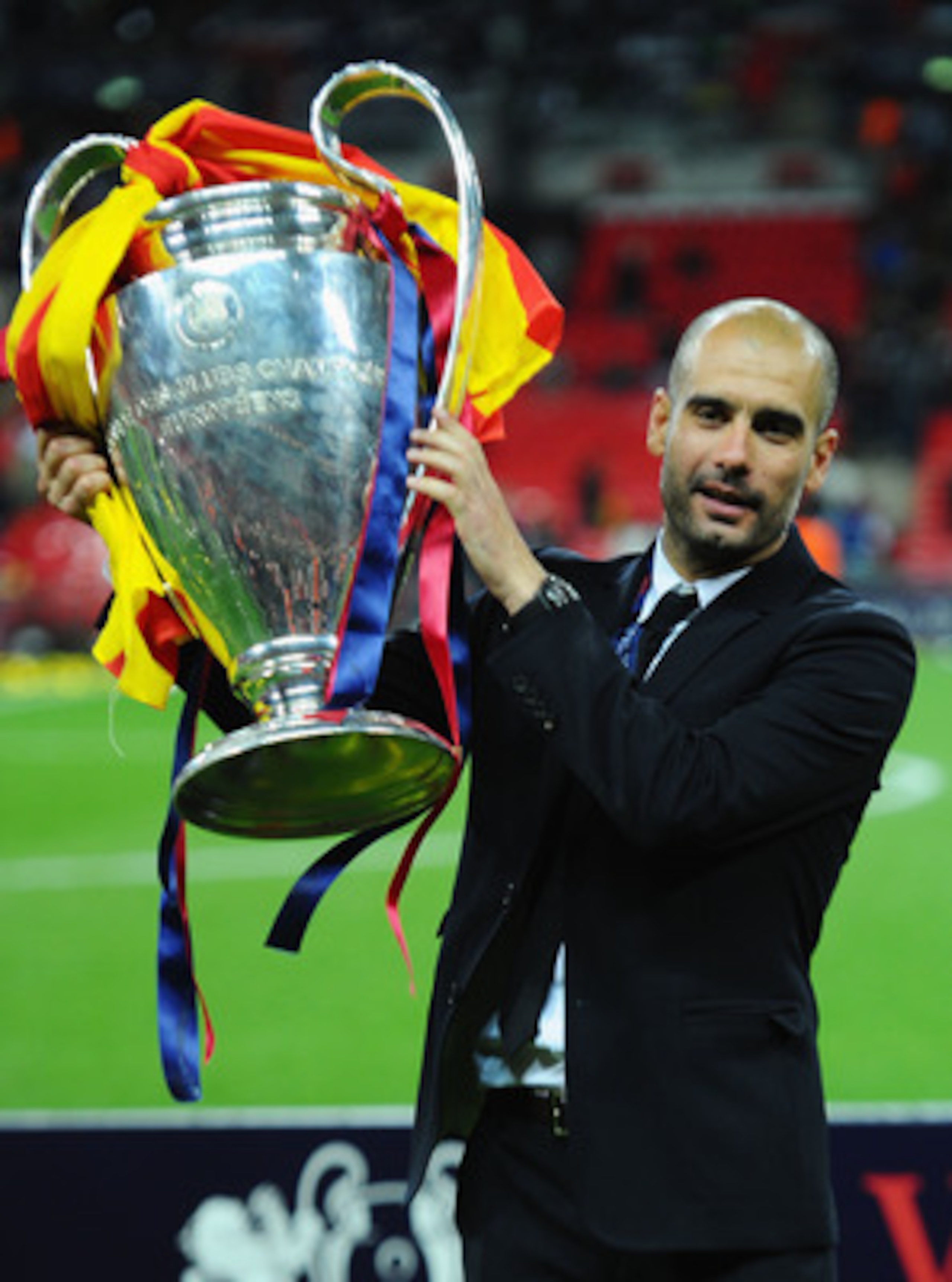 LONDON, ENGLAND - MAY 28: Josep Guardiola manager of FC Barcelona lifts the trophy after victory in the UEFA Champions League final between FC Barcelona and Manchester United FC at Wembley Stadium on May 28, 2011 in London, England. (Photo by Clive Maso LONDON, ENGLAND - MAY 28: Josep Guardiola manager of FC Barcelona lifts the trophy after victory in the UEFA Champions League final between FC Barcelona and Manchester United FC at Wembley Stadium on May 28, 2011 in London, England. (Photo by Clive Maso