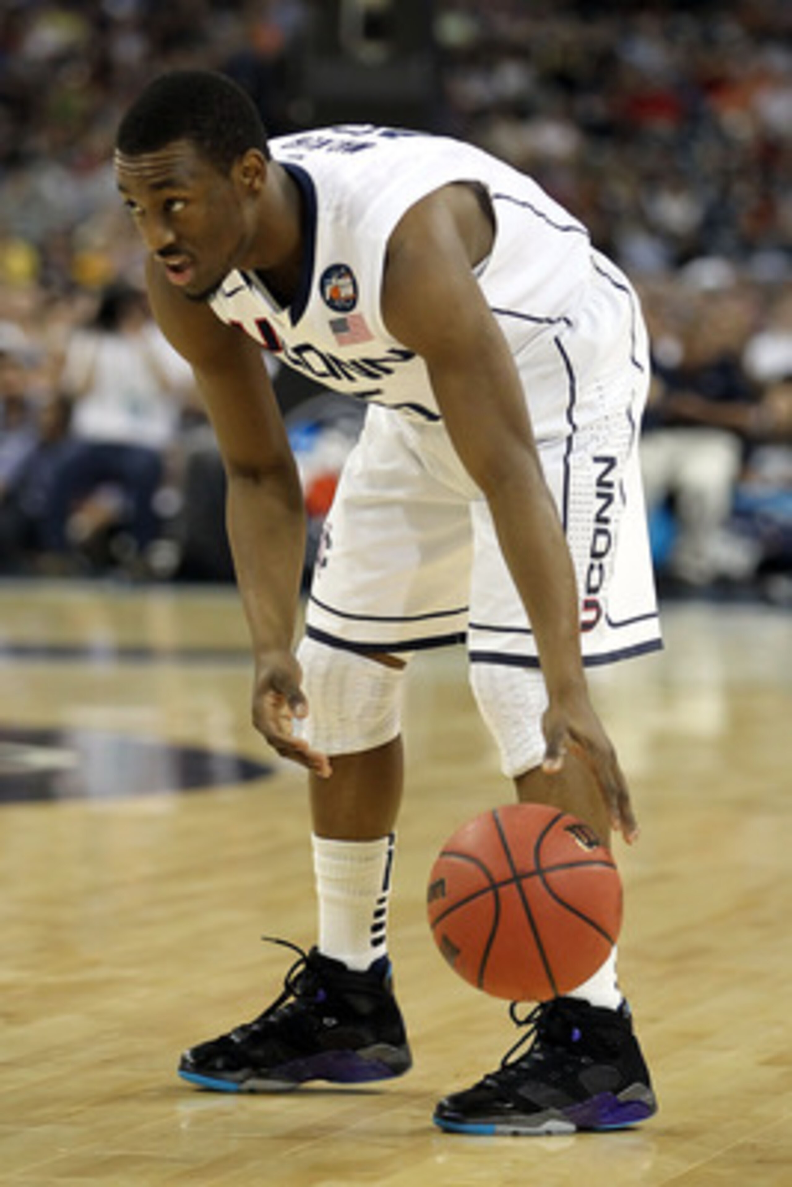 HOUSTON, TX - APRIL 04:  Kemba Walker #15 of the Connecticut Huskies handles the ball against the Butler Bulldogs during the National Championship Game of the 2011 NCAA Division I Men's Basketball Tournament at Reliant Stadium on April 4, 2011 in Houston,
