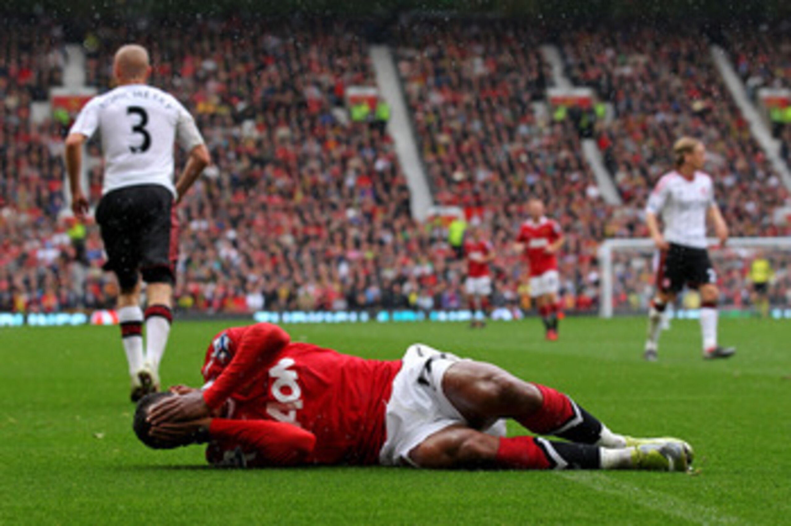 MANCHESTER, ENGLAND - SEPTEMBER 19:  Nani of Manchester United reacts following a challenge by Paul Konchesky of Liverpool during the Barclays Premier League match between Manchester United and Liverpool at Old Trafford on September 19, 2010 in Manchester