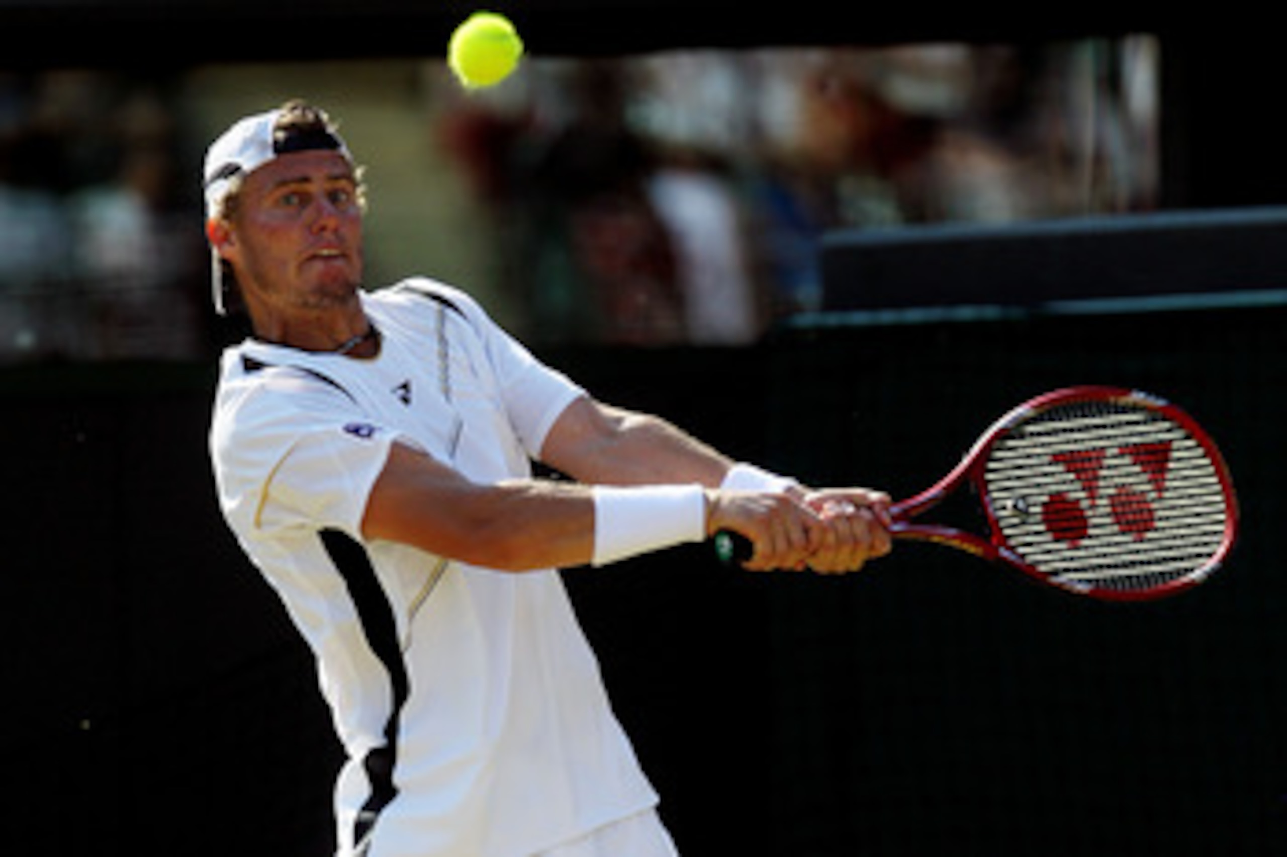 LONDON, ENGLAND - JUNE 28:  Lleyton Hewitt of Australia in action during his match against Novak Djokovic of Serbia on Day Seven of the Wimbledon Lawn Tennis Championships at the All England Lawn Tennis and Croquet Club on June 28, 2010 in London, England