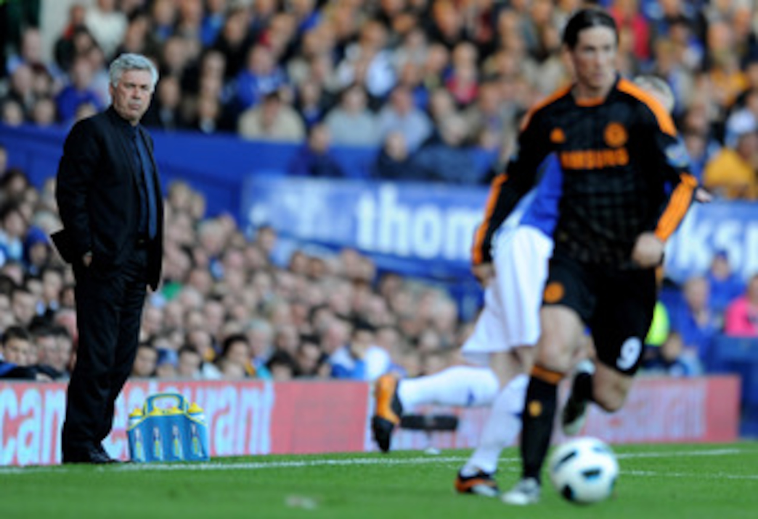 LIVERPOOL, ENGLAND - MAY 22:  Chelsea Manager Carlo Ancelotti watches Fernando Torres during the Barclays Premier League match between Everton and Chelsea at Goodison Park on May 22, 2011 in Liverpool, England.  (Photo by Chris Brunskill/Getty Images)