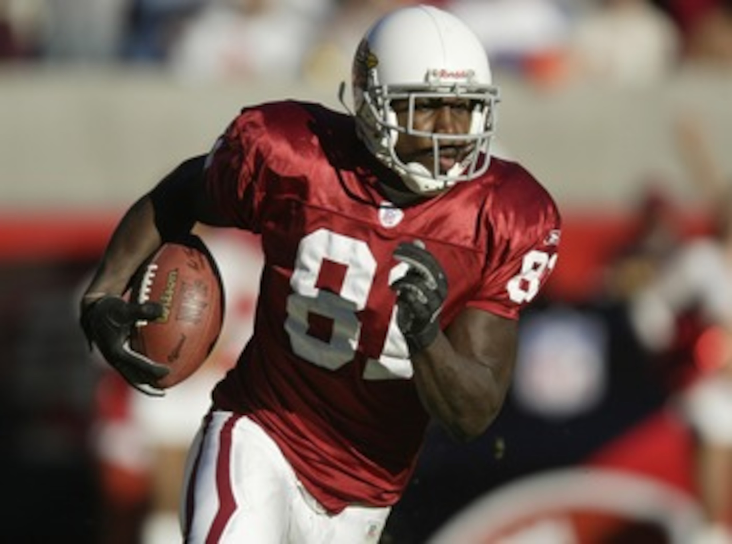 TEMPE - NOVEMBER 23:  Wide Receiver Anquan Boldin #81 of the Arizona Cardinals rushes against the St. Louis Rams on November 23 2003 at Sun Devil Stadium in Tempe, Arizona.  (Photo by Otto Greule Jr/Getty Images)