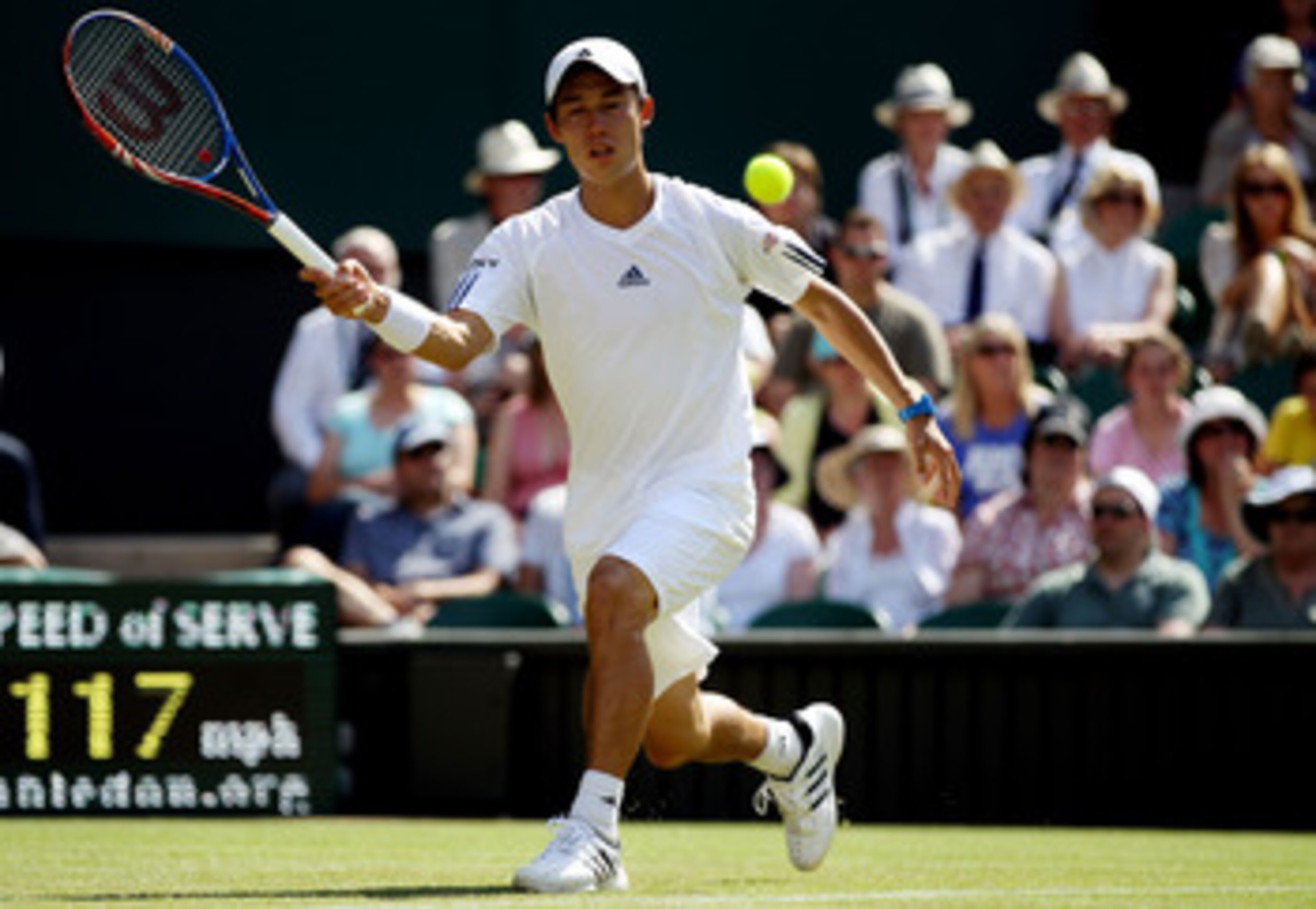 LONDON, ENGLAND - JUNE 22:  Kei Nishikori of Japan during the first round match against Rafael Nadal of Spain on Day Two of the Wimbledon Lawn Tennis Championships at the All England Lawn Tennis and Croquet Club on June 22, 2010 in London, England.  (Phot