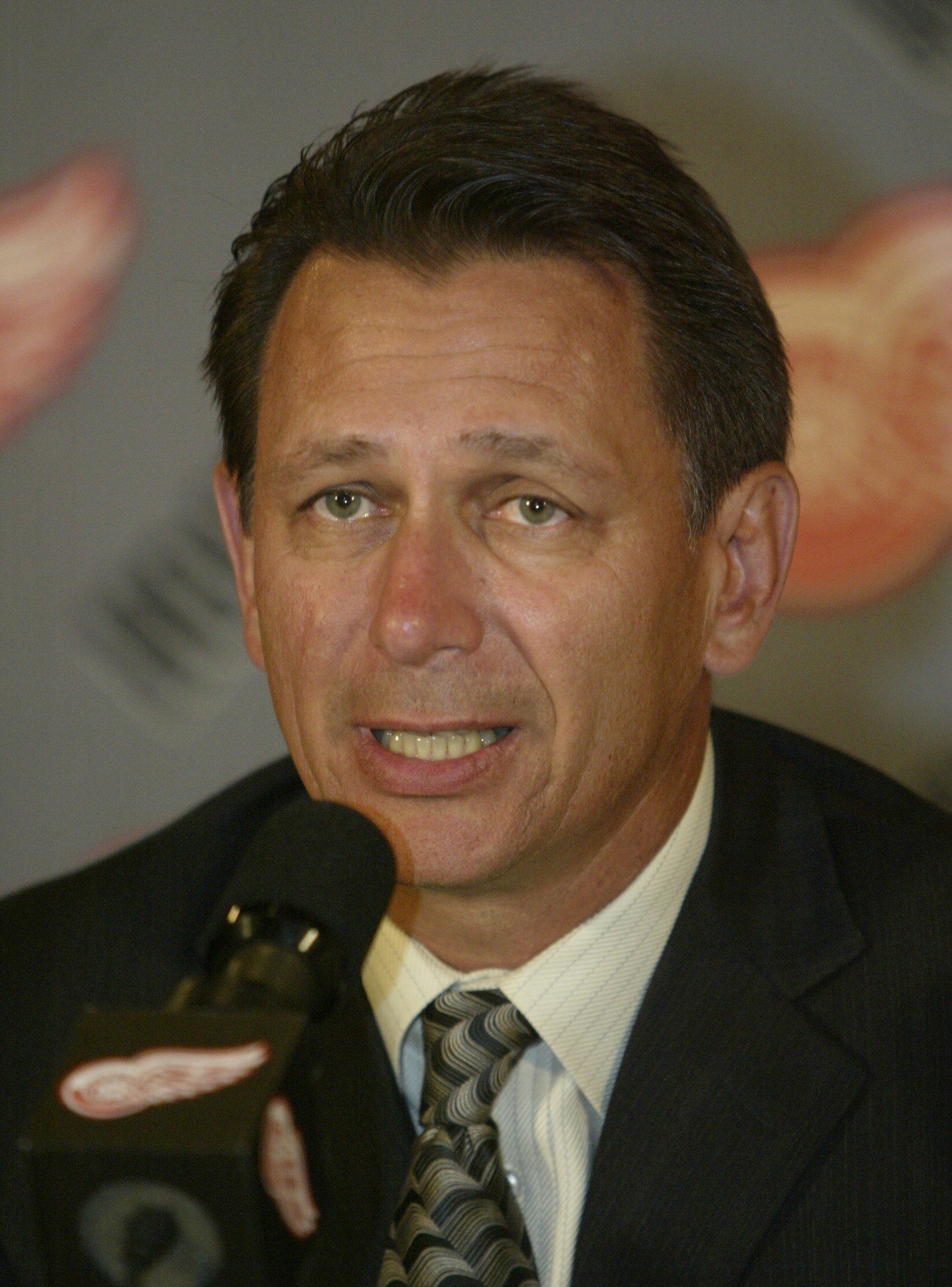 DETROIT - JULY 15:  General Manager Ken Holland of the Detroit Red Wings talks to the press during a news conference to announce Babcock's hiring on July 15, 2005 at Joe Louis Arena in Detroit, Michigan. (Photo by Tom Pidgeon/Getty Images)