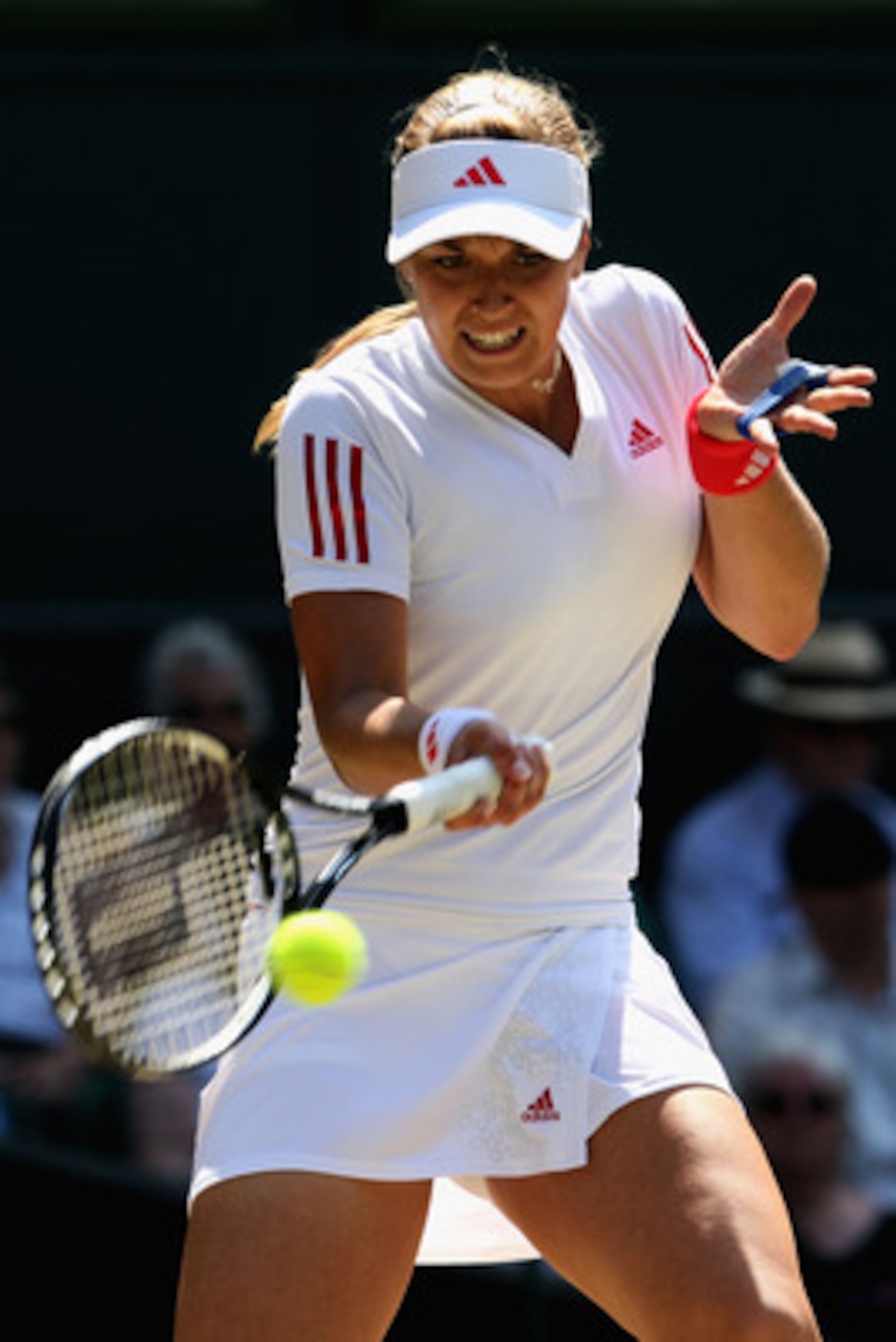 WIMBLEDON, ENGLAND - JUNE 30:  Sabine Lisicki of Germany plays a forehand during the women's singles quarter final match against Dinara Safina of Russia on Day Eight of the Wimbledon Lawn Tennis Championships at the All England Lawn Tennis and Croquet Clu