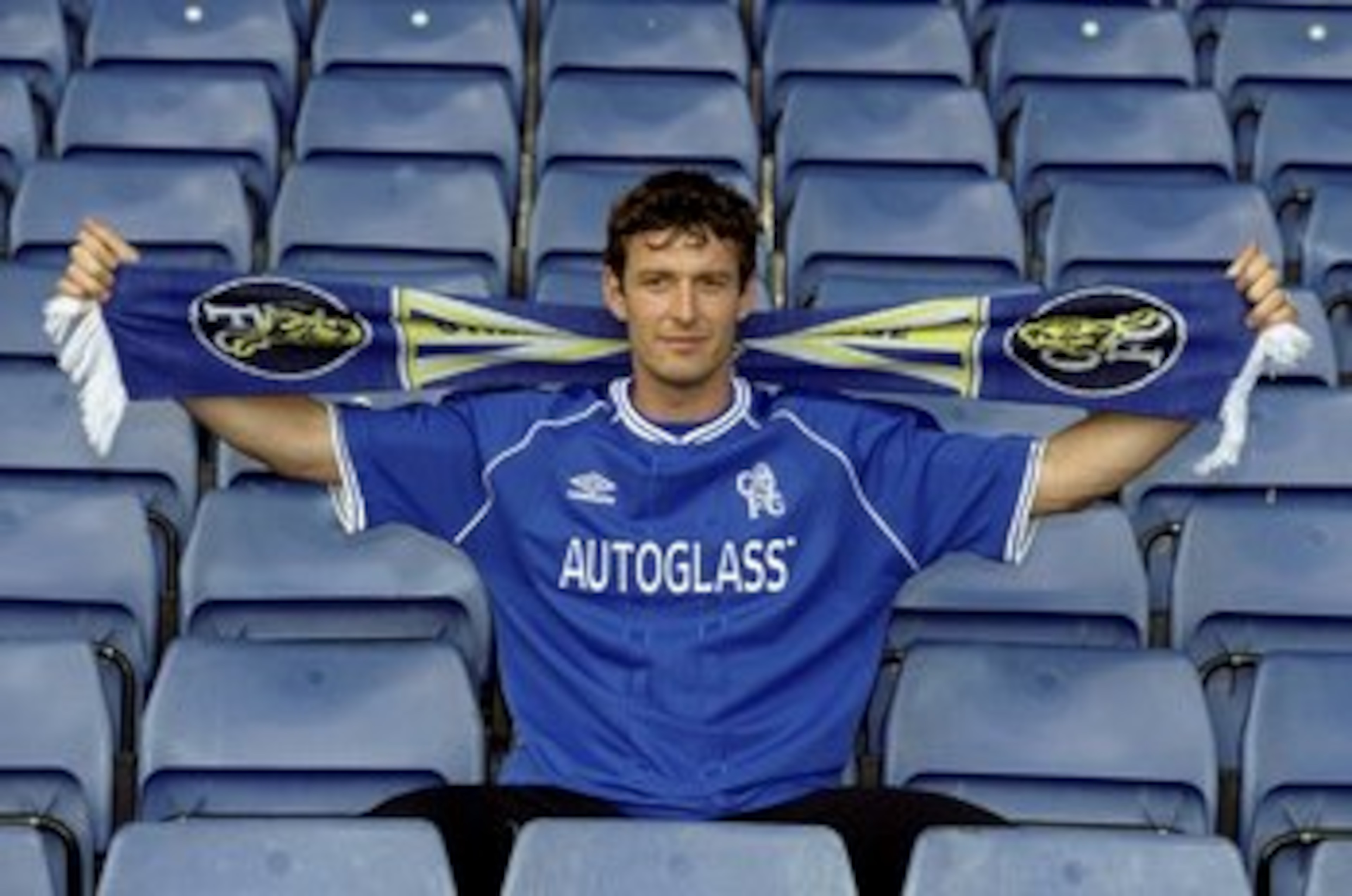 5 Jul 1999:  Chris Sutton the former Blackburn Rovers player signs for Chelsea Football Club for the fee of 10 million pounds during a photo-shoot held in Chelsea, England. \ Mandatory Credit: Craig Prentis /Allsport