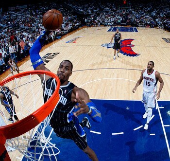 ATLANTA, GA - APRIL 28:  Dwight Howard #12 of the Orlando Magic dunks against the Atlanta Hawks during Game Six of the Eastern Conference Quarterfinals in the 2011 NBA Playoffs at Philips Arena on April 28, 2011 in Atlanta, Georgia.  NOTE TO USER: User ex