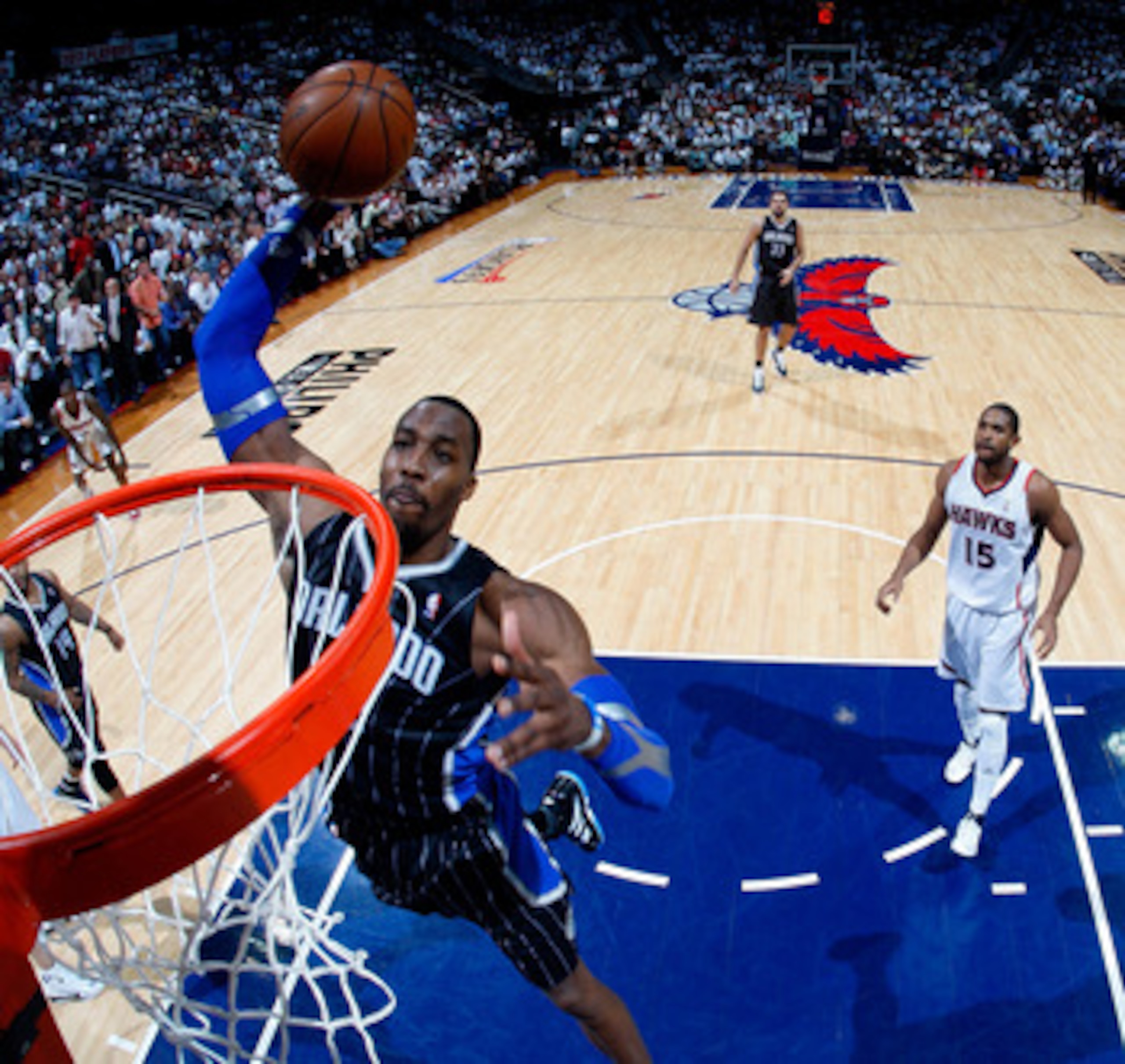 ATLANTA, GA - APRIL 28:  Dwight Howard #12 of the Orlando Magic dunks against the Atlanta Hawks during Game Six of the Eastern Conference Quarterfinals in the 2011 NBA Playoffs at Philips Arena on April 28, 2011 in Atlanta, Georgia.  NOTE TO USER: User ex