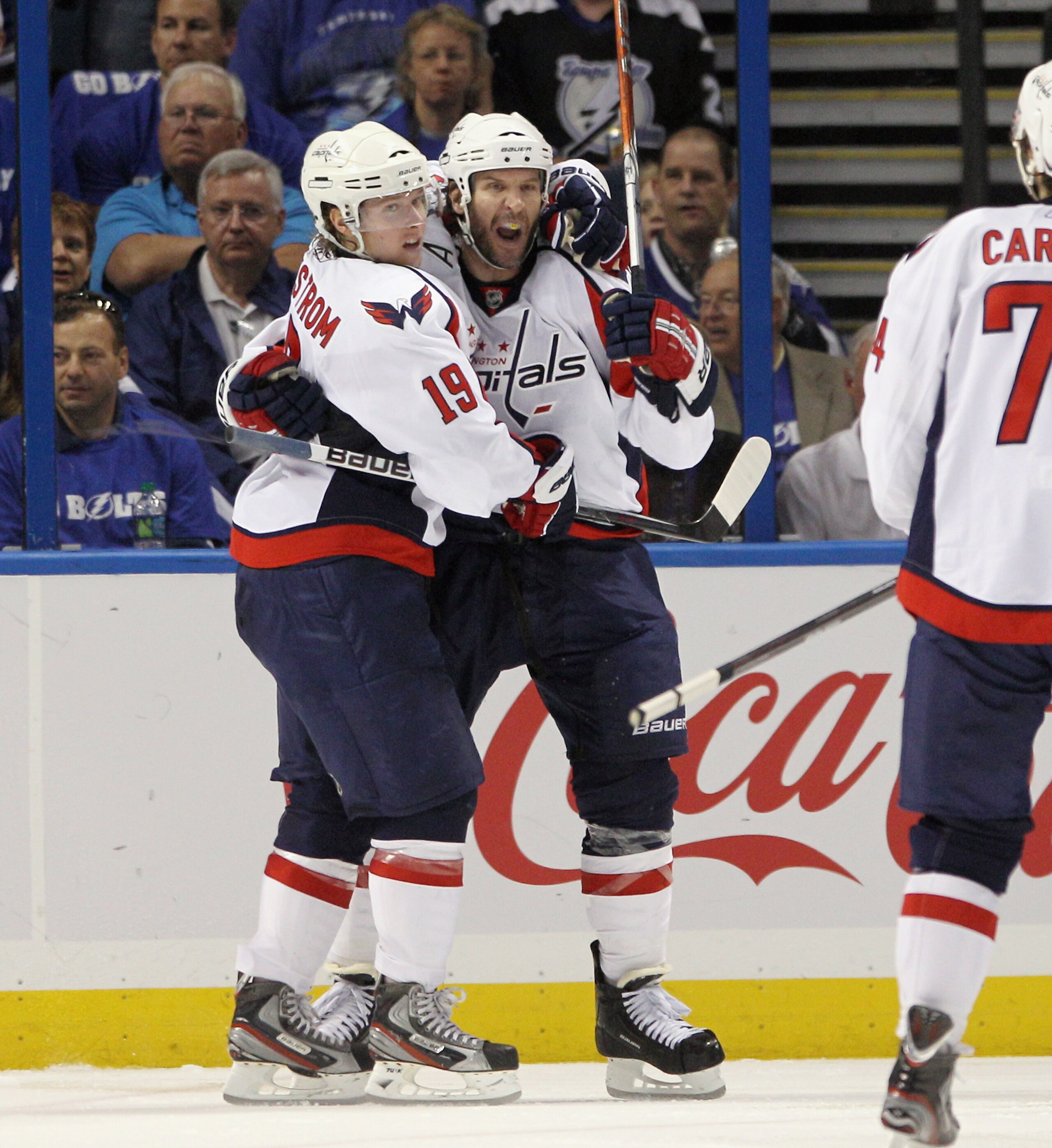 TAMPA, FL - MAY 03:  Mike Knuble #22 of the Washington Capitals (R) scores at 59 seconds of the second period against the Tampa Bay Lightning and is hugged by Nicklas Backstrom #19 (L) in Game Three of the Eastern Conference Semifinals during the 2011 NHL
