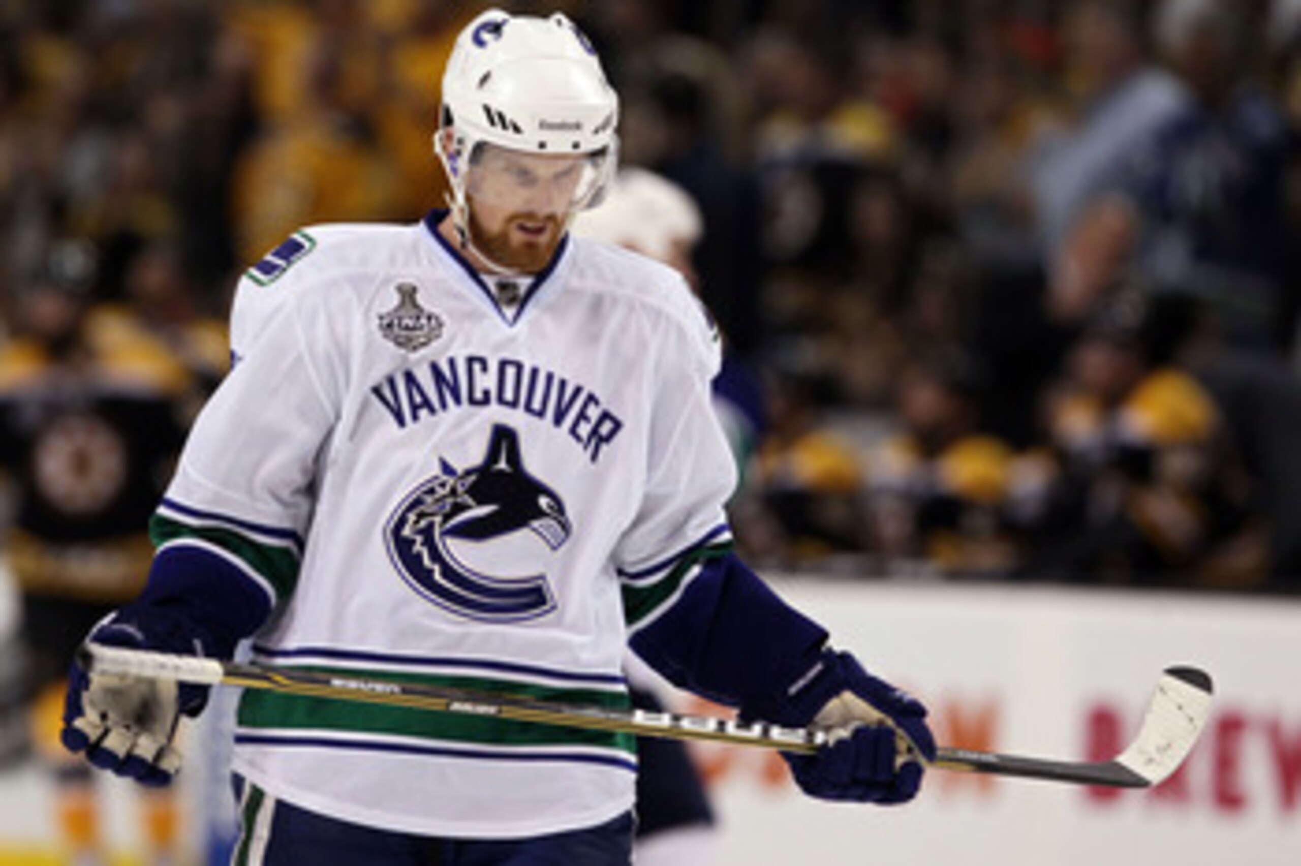 BOSTON, MA - JUNE 13:  Daniel Sedin #22 of the Vancouver Canucks looks on during Game Six against the Boston Bruins in the 2011 NHL Stanley Cup Final at TD Garden on June 13, 2011 in Boston, Massachusetts.  (Photo by Elsa/Getty Images)