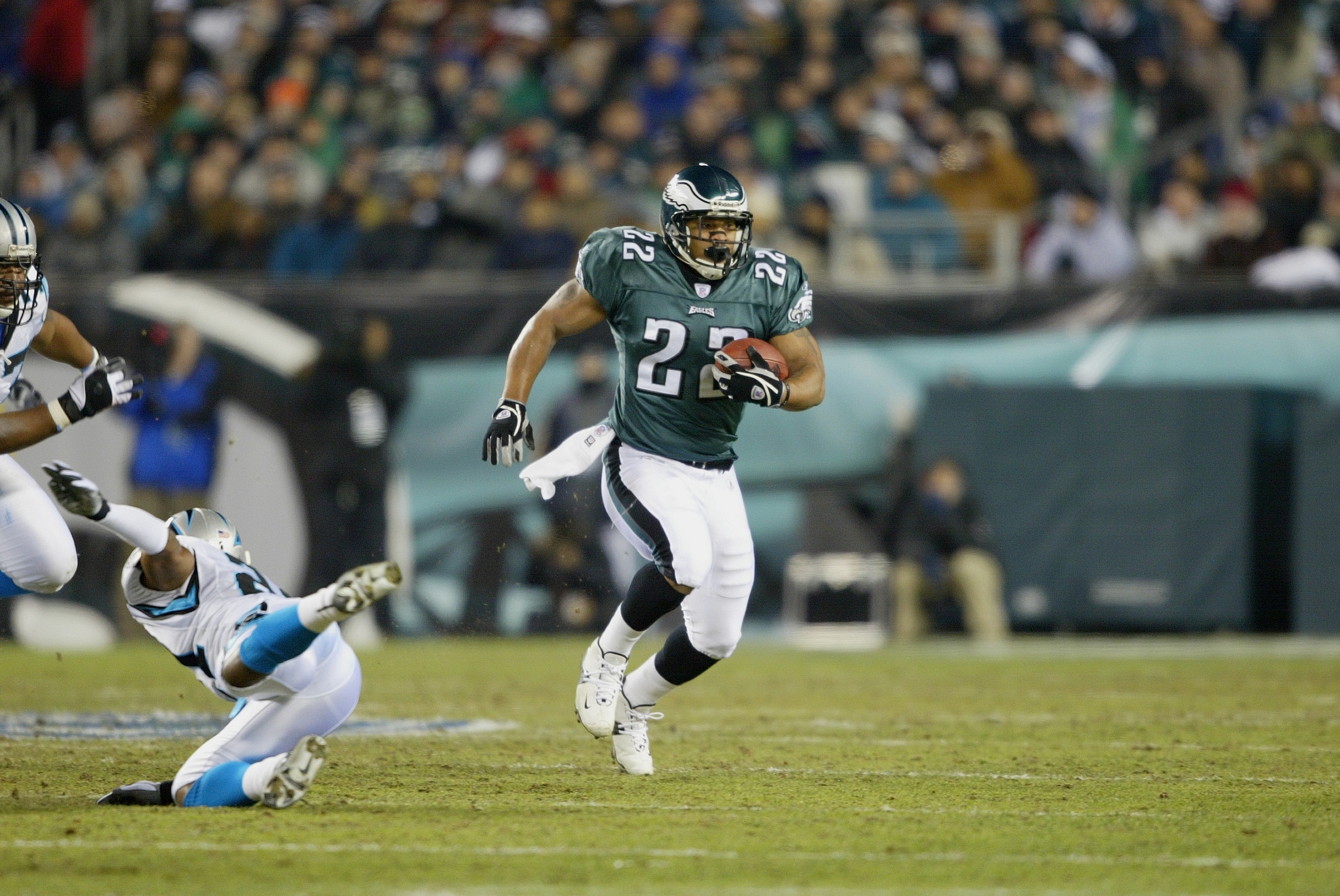 PHILADELPHIA - JANUARY 18:  Running back Duce Staley #22 of the Philadelphia Eagles runs the football during the game against the Carolina Panthers in the NFC Championship game on January 18, 2004 at Lincoln Financial Field in Philadelphia, Pennsylvania. 