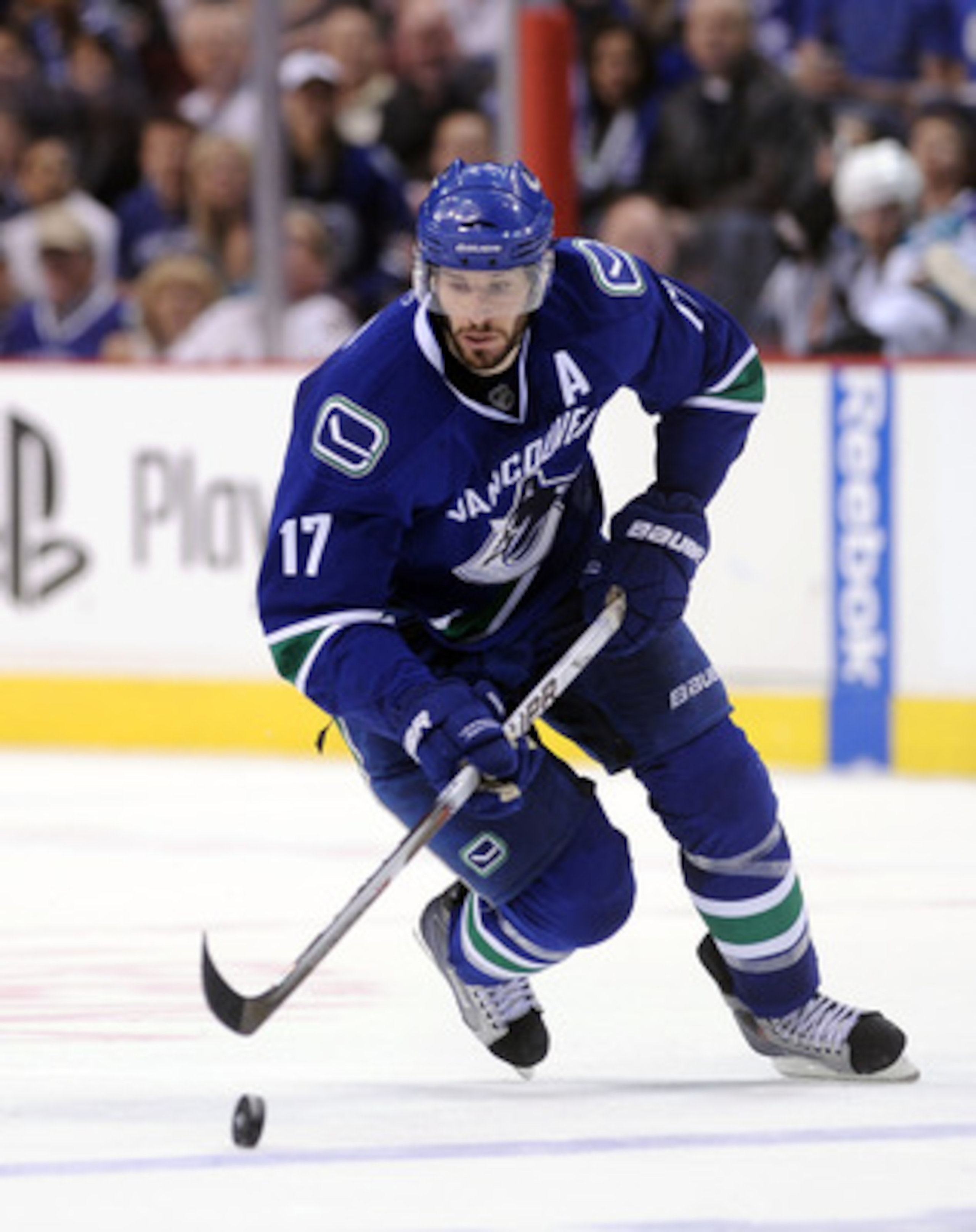 VANCOUVER, CANADA - MAY 18:  Ryan Kesler #17 of the Vancouver Canucks skates the puck across the blue line in Game Two of the Western Conference Finals against the San Jose Sharks during the 2011 Stanley Cup Playoffs at Rogers Arena on May 18, 2011 in Van