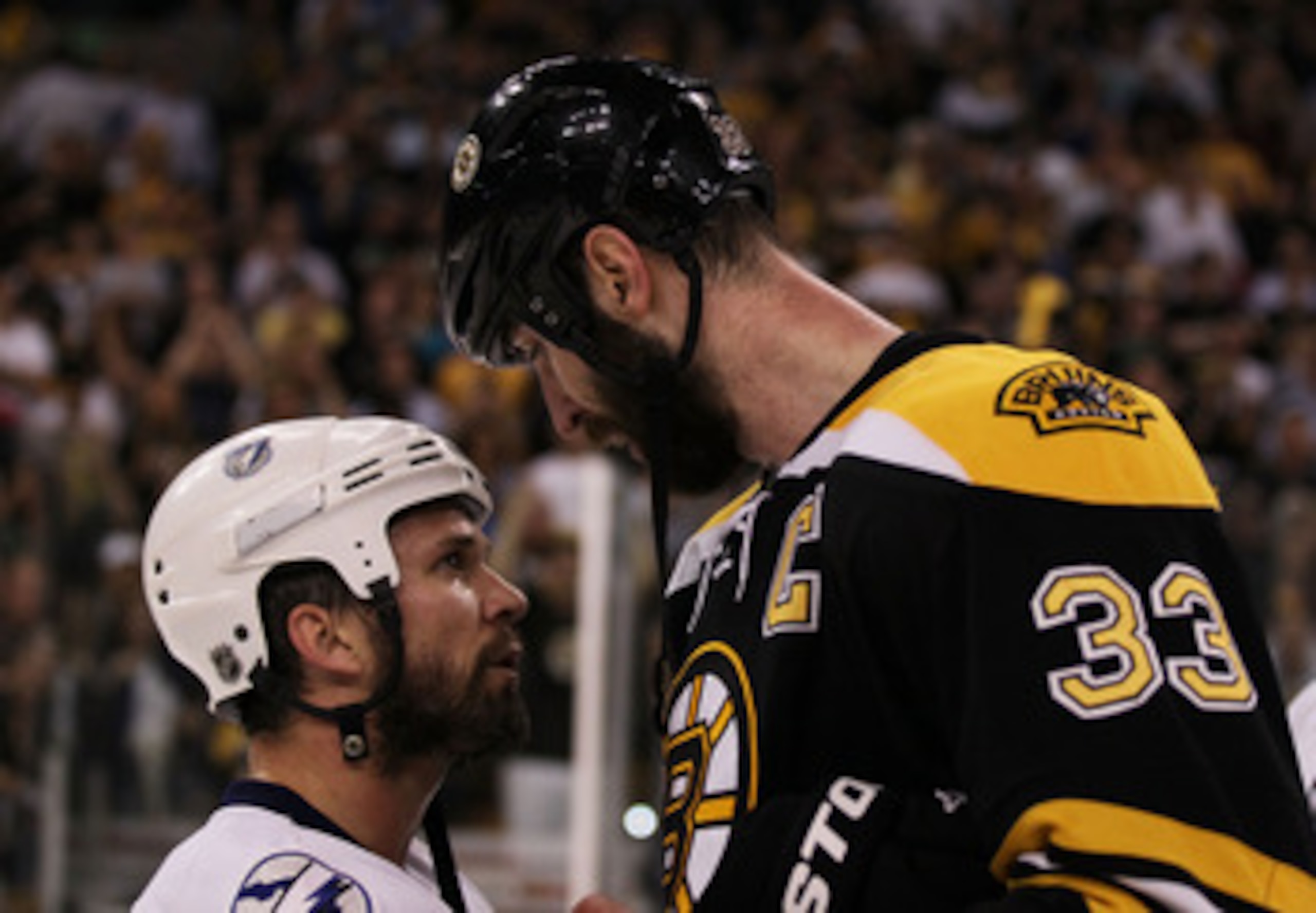 BOSTON, MA - MAY 27:  Martin St. Louis #26 of the Tampa Bay Lightning congratulates Zdeno Chara #33 of the Boston Bruins after the Bruins defeated the Lightning 1 to 0 in Game Seven of the Eastern Conference Finals during the 2011 NHL Stanley Cup Playoffs