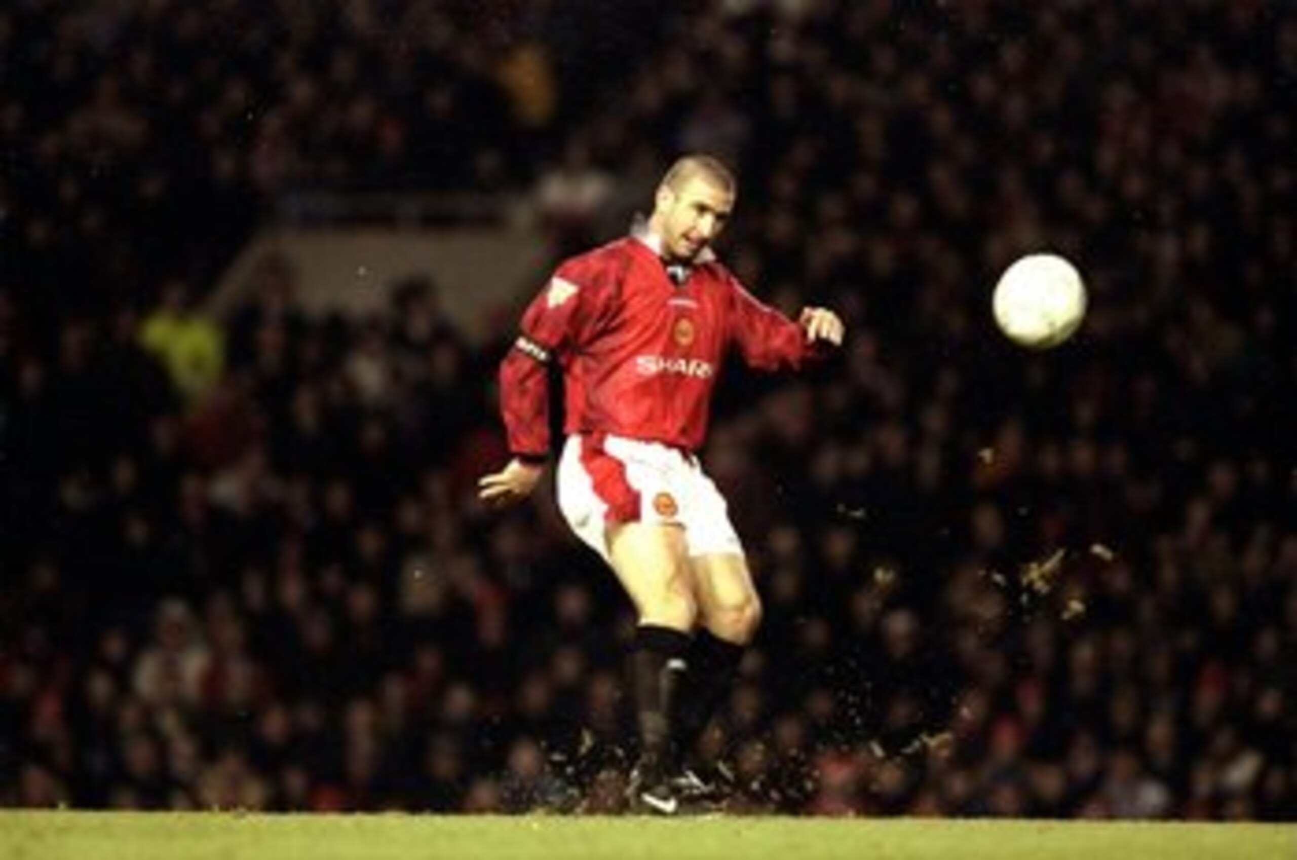 21 Dec 1996:  Eric Cantona of Manchester United in action during an FA Carling Premiership match against Sunderland at Old Trafford in Manchester, England. Manchester United won the match 5-0. \ Mandatory Credit: Mark  Thompson/Allsport