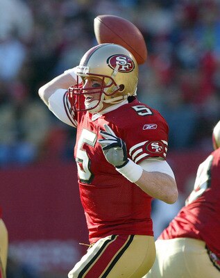SAN FRANCISCO - DECEMBER 27:  Quarterback Jeff Garcia #5 of the San Francisco 49ers passes against the Seattle Seahawks during an NFL game on December 27, 2003 at Candlestick Park in San Francisco, California.  (Photo by Jed Jacobsohn/Getty Images)