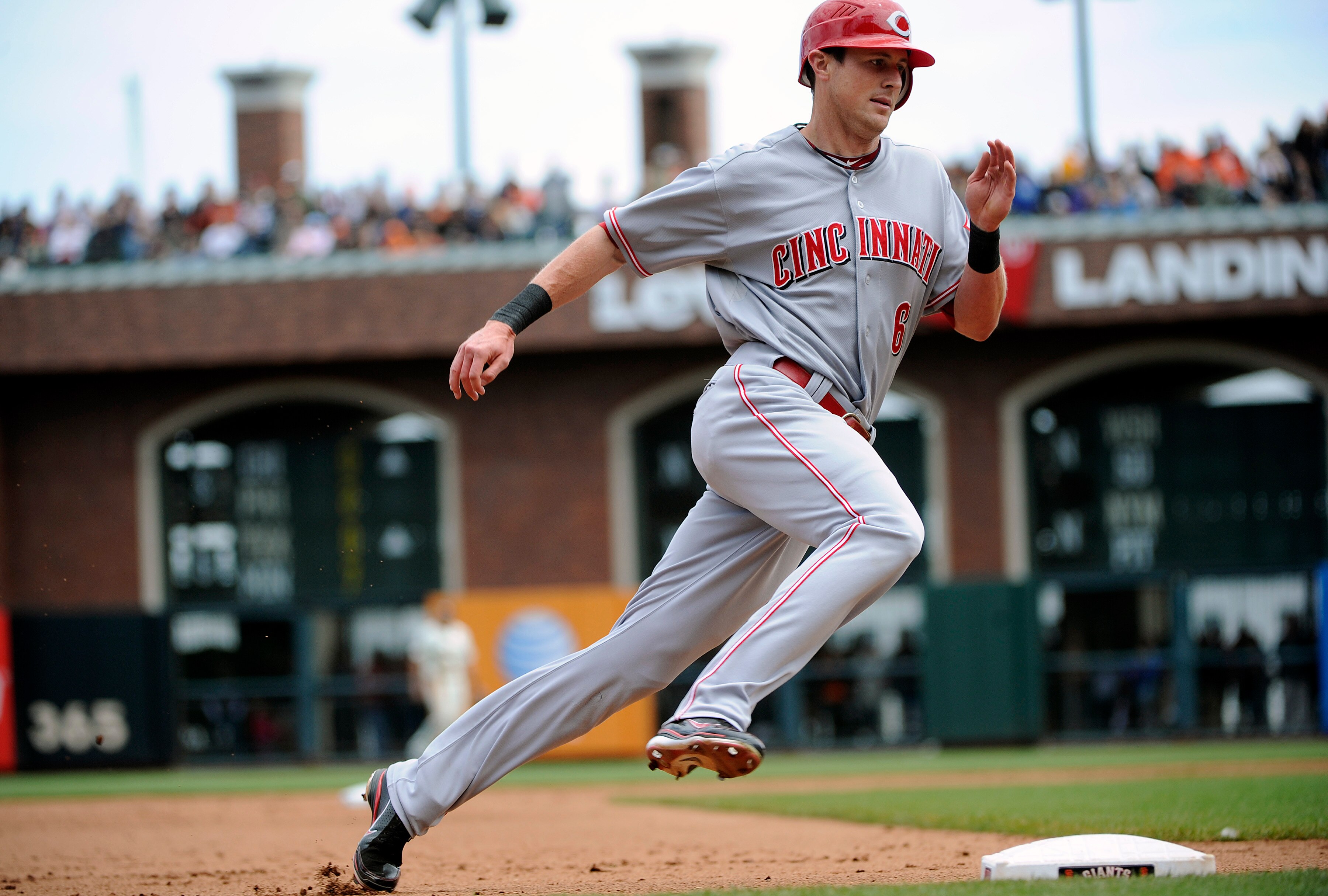 SAN FRANCISCO, CA - JUNE 11: Drew Stubbs #6 of the Cincinnati Reds rounds third base to score on Brandon Phillips double against the San Francisco Giants in the fifth inning during a MLB baseball game June 11, 2011 at AT&T Park in San Francisco, Californi