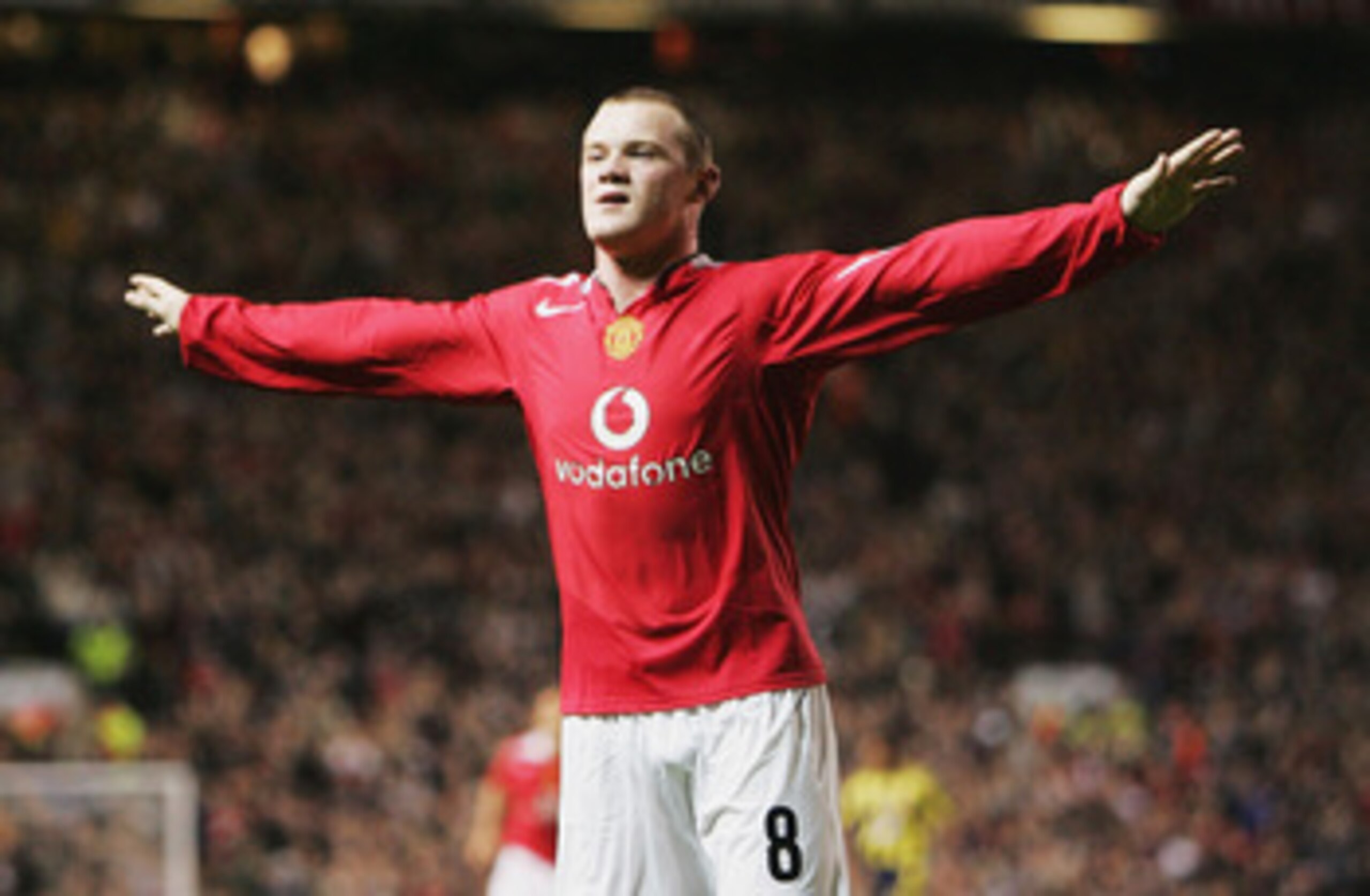 MANCHESTER, ENGLAND - SEPTEMBER 28:  Wayne Rooney of Manchester United celebrates his second goal during the UEFA Champions League Group D match between Manchester United and Fenerbahce SK at Old Trafford on September 28, 2004 in Manchester, England.  (Ph