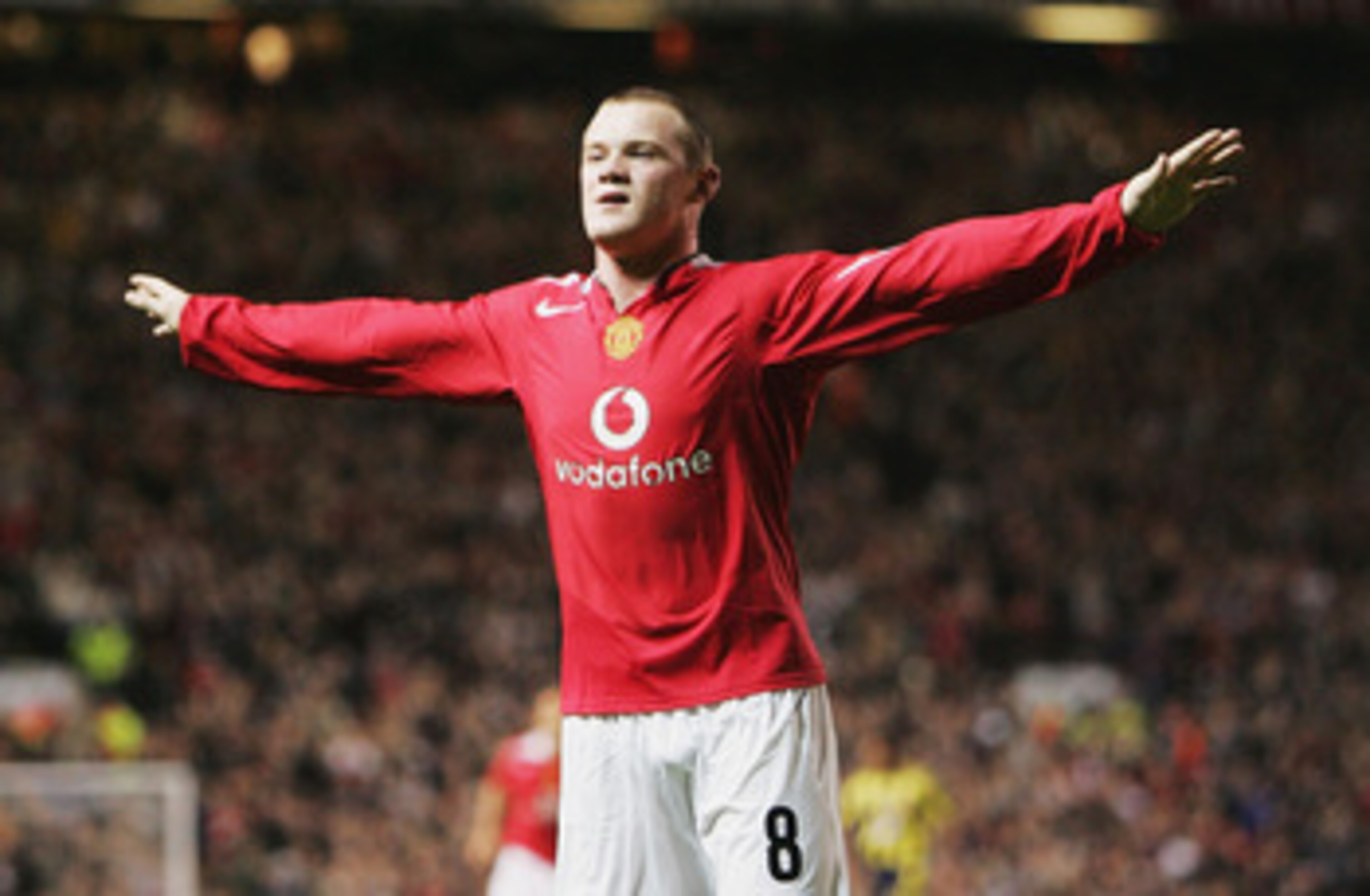 MANCHESTER, ENGLAND - SEPTEMBER 28:  Wayne Rooney of Manchester United celebrates his second goal during the UEFA Champions League Group D match between Manchester United and Fenerbahce SK at Old Trafford on September 28, 2004 in Manchester, England.  (Ph