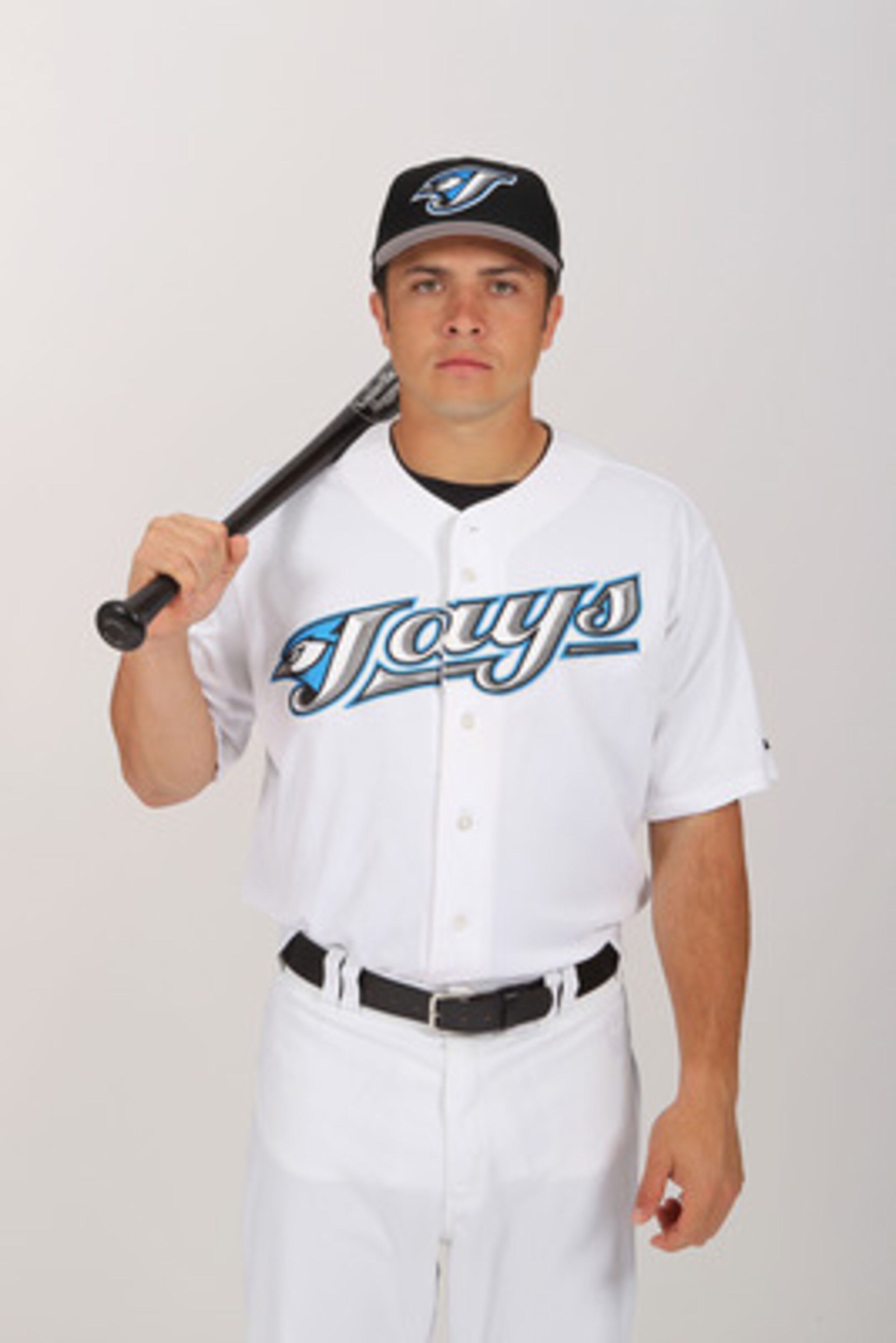 DUNEDIN, FL - FEBRUARY 20:  Travis d'Arnaud #15 of the Toronto Blue Jays poses during photo day at Florida Auto Exchange Stadium on February 20, 2011 in Dunedin, Florida.  (Photo by Nick Laham/Getty Images)