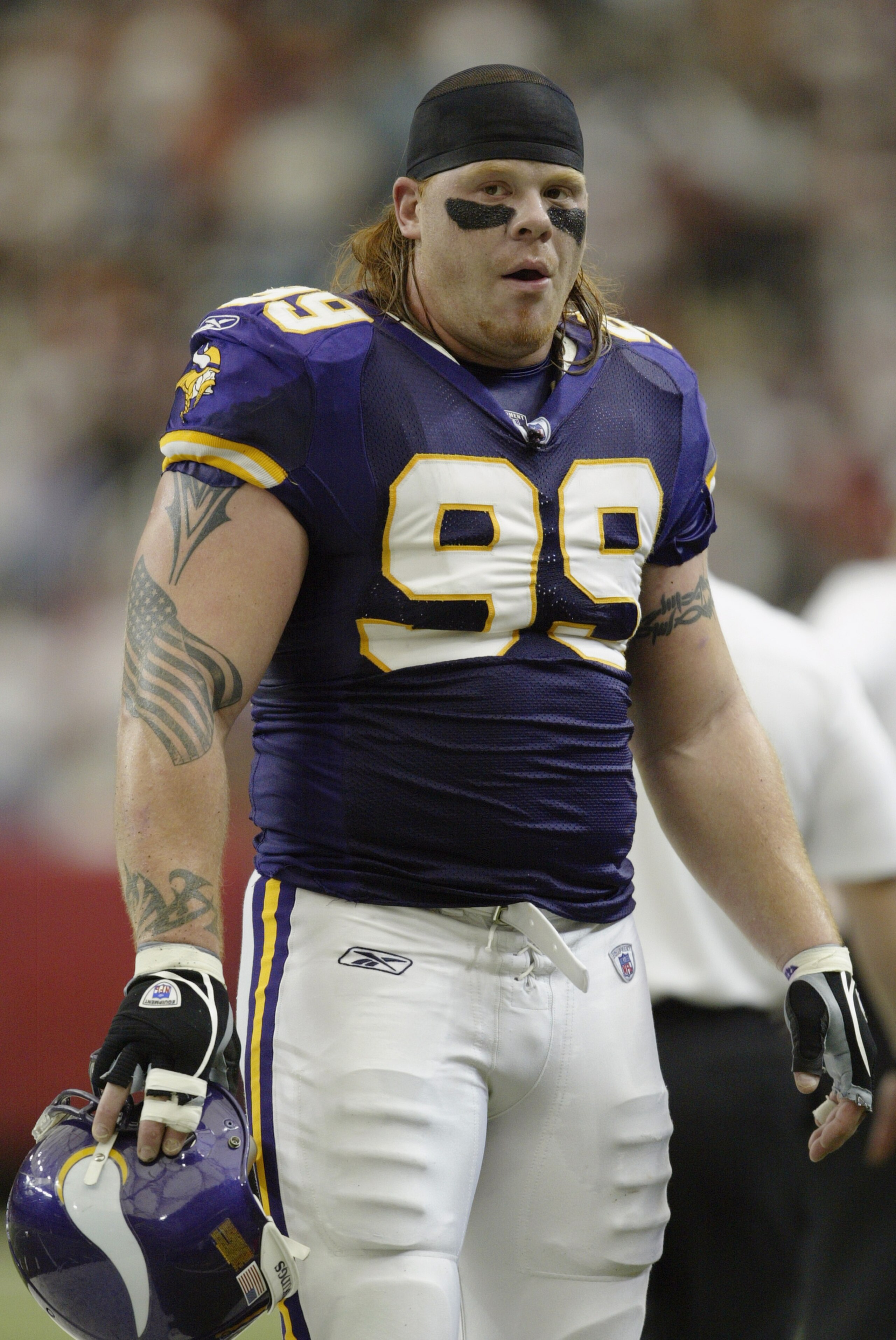 ATLANTA - OCTOBER 5: Defensive tackle Chris Hovan #99 of the Minnesota Vikings walks to the sidelines against the Atlanta Falcons on October 5, 2003 at the Georgia Dome in Atlanta, Georgia. The Vikings defeated the Falcons 30-20. (Photo by Brian Bahr/Get ATLANTA - OCTOBER 5: Defensive tackle Chris Hovan #99 of the Minnesota Vikings walks to the sidelines against the Atlanta Falcons on October 5, 2003 at the Georgia Dome in Atlanta, Georgia. The Vikings defeated the Falcons 30-20. (Photo by Brian Bahr/Get