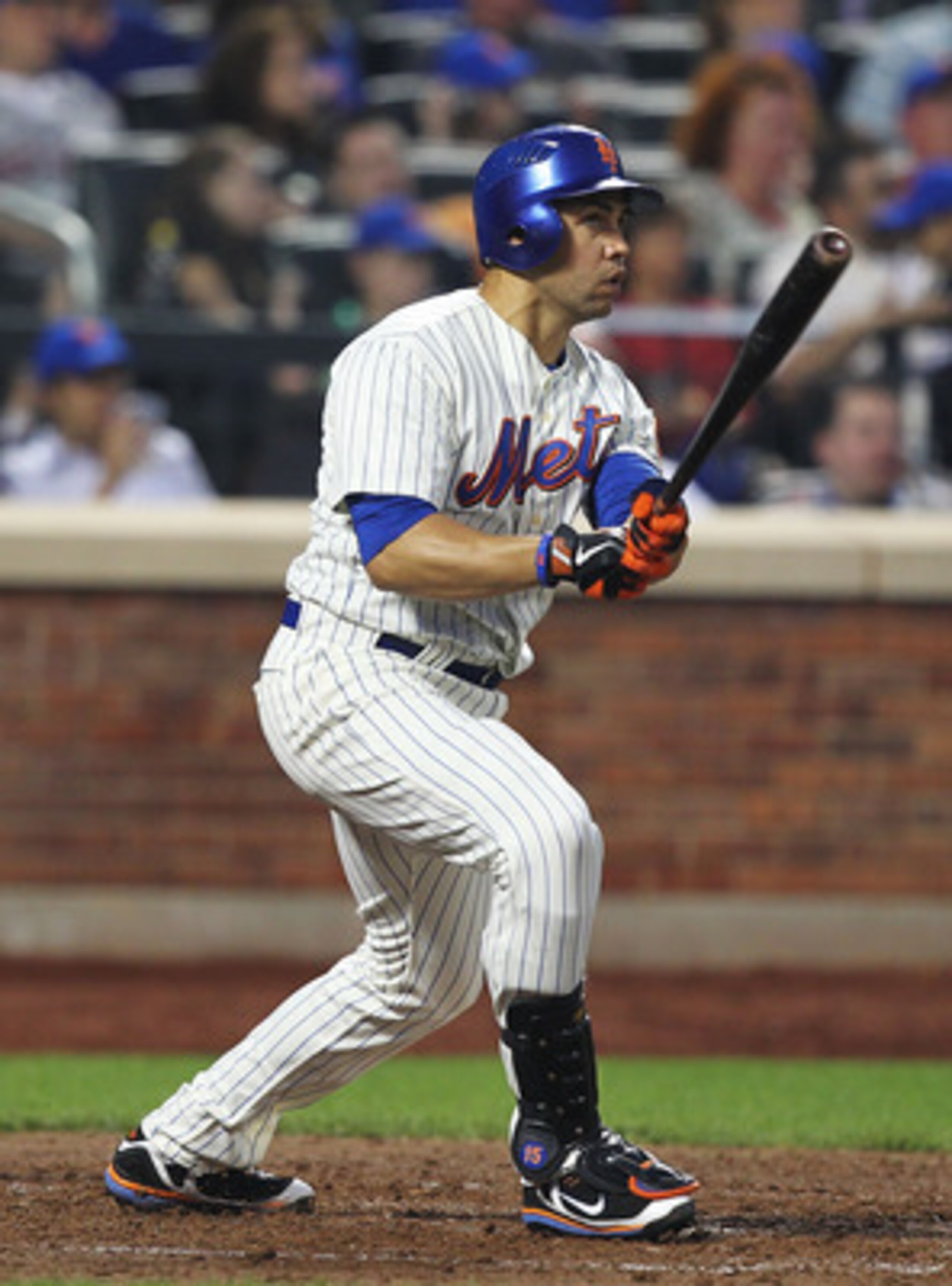NEW YORK, NY - JUNE 18:  Carlos Beltran #15 of the New York Mets hits a two run home run in the fifth inning against the Los Angeles Angels of Anaheim during their game on June 18, 2011 at Citi Field in the Flushing neighborhood of the Queens borough of N