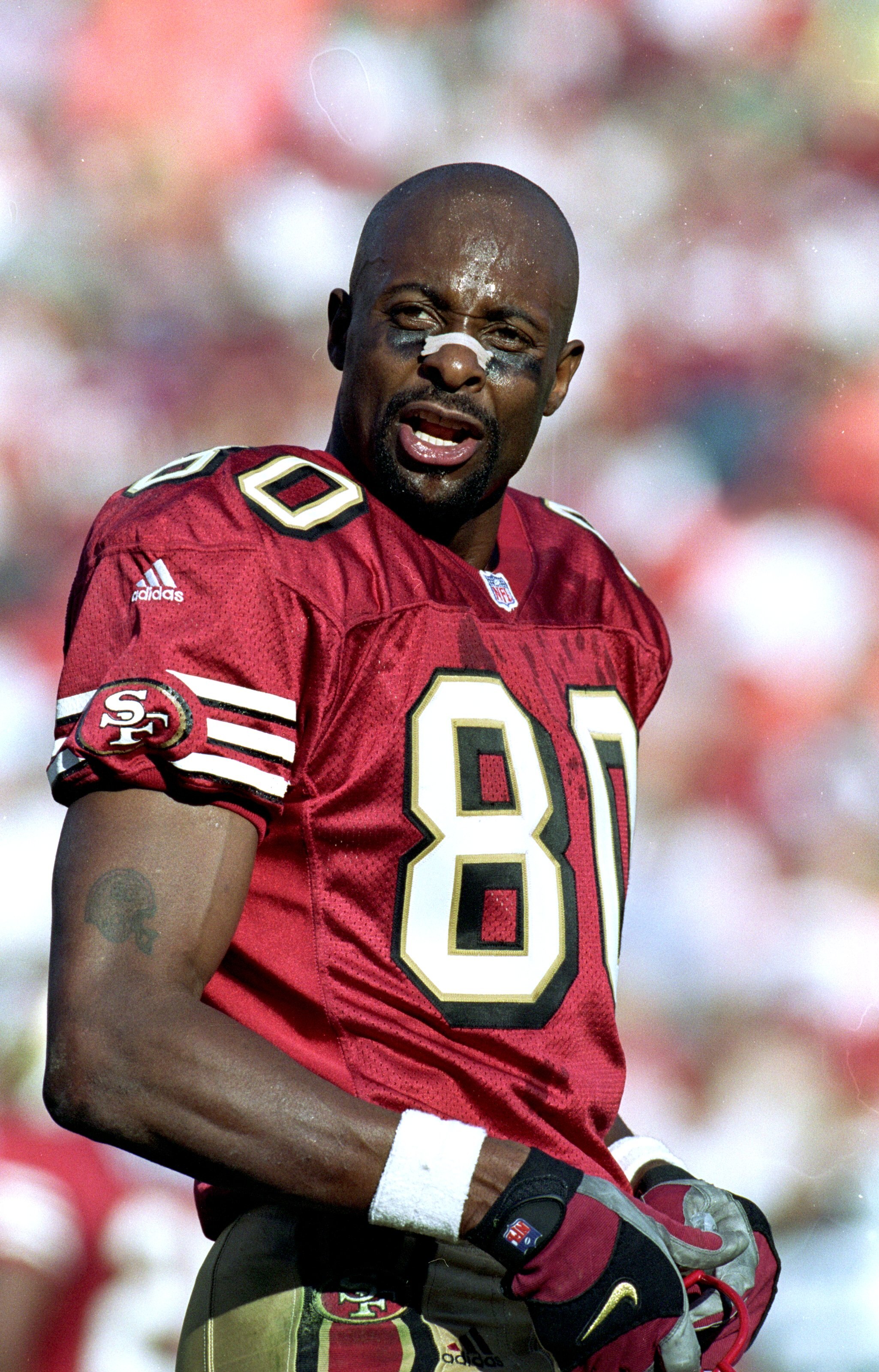 17 Oct 1999:  Jerry Rice #80 of the San Francisco 49ers looks on the field during the game against the Carolina Panthers at 3Com Park in San Francisco, Califonia. The Panthers defeated the 49ers 31-29. Mandatory Credit: Otto Greule Jr.  /Allsport
