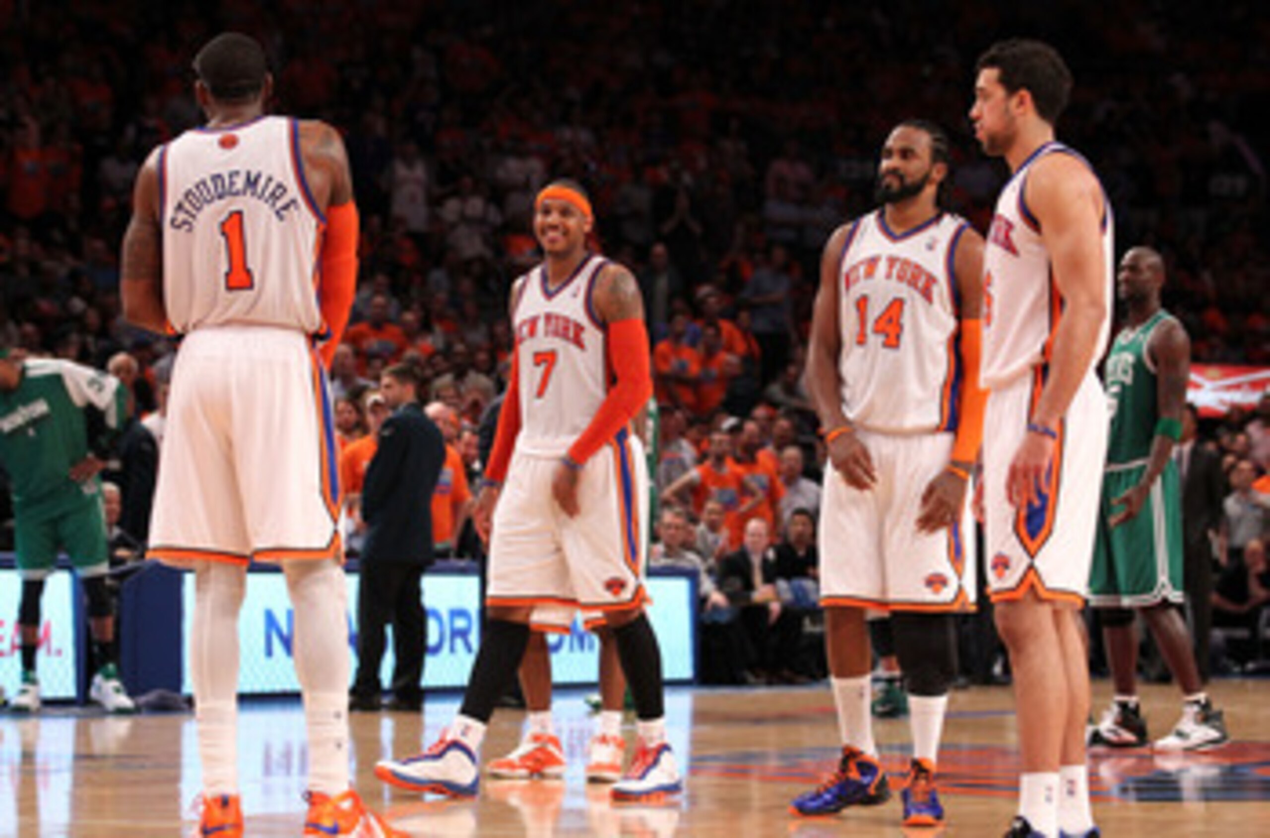 NEW YORK, NY - APRIL 24:  (L-R) Amar'e Stoudemire #1, Carmelo Anthony #7, Ronny Turiaf #14 and Landry Fields #6 of the New York Knicks look on against the Boston Celtics in Game Four of the Eastern Conference Quarterfinals during the 2011 NBA Playoffs on