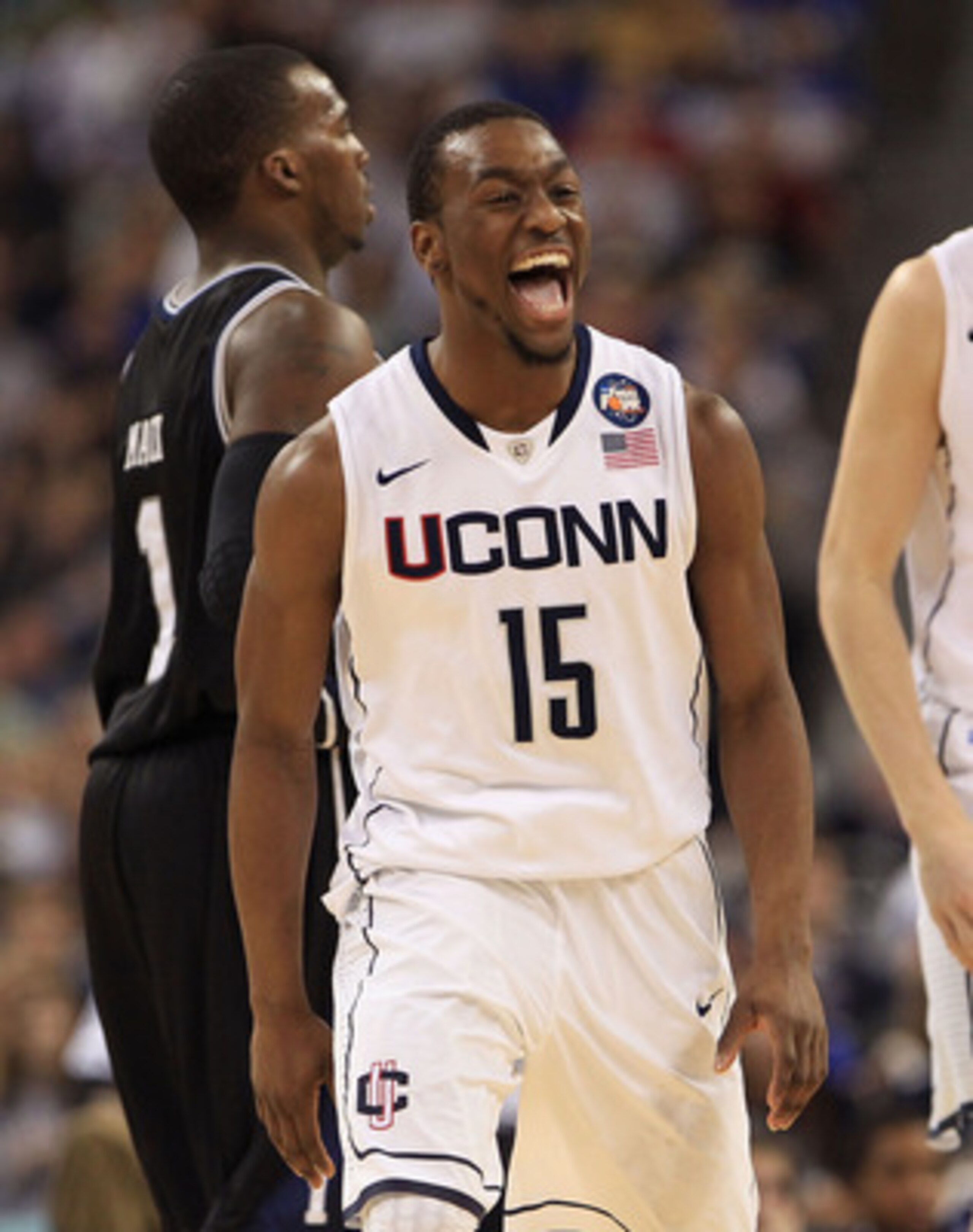 HOUSTON, TX - APRIL 04:  Kemba Walker #15 of the Connecticut Huskies reacts after a play against the Butler Bulldogs during the National Championship Game of the 2011 NCAA Division I Men's Basketball Tournament at Reliant Stadium on April 4, 2011 in Houst