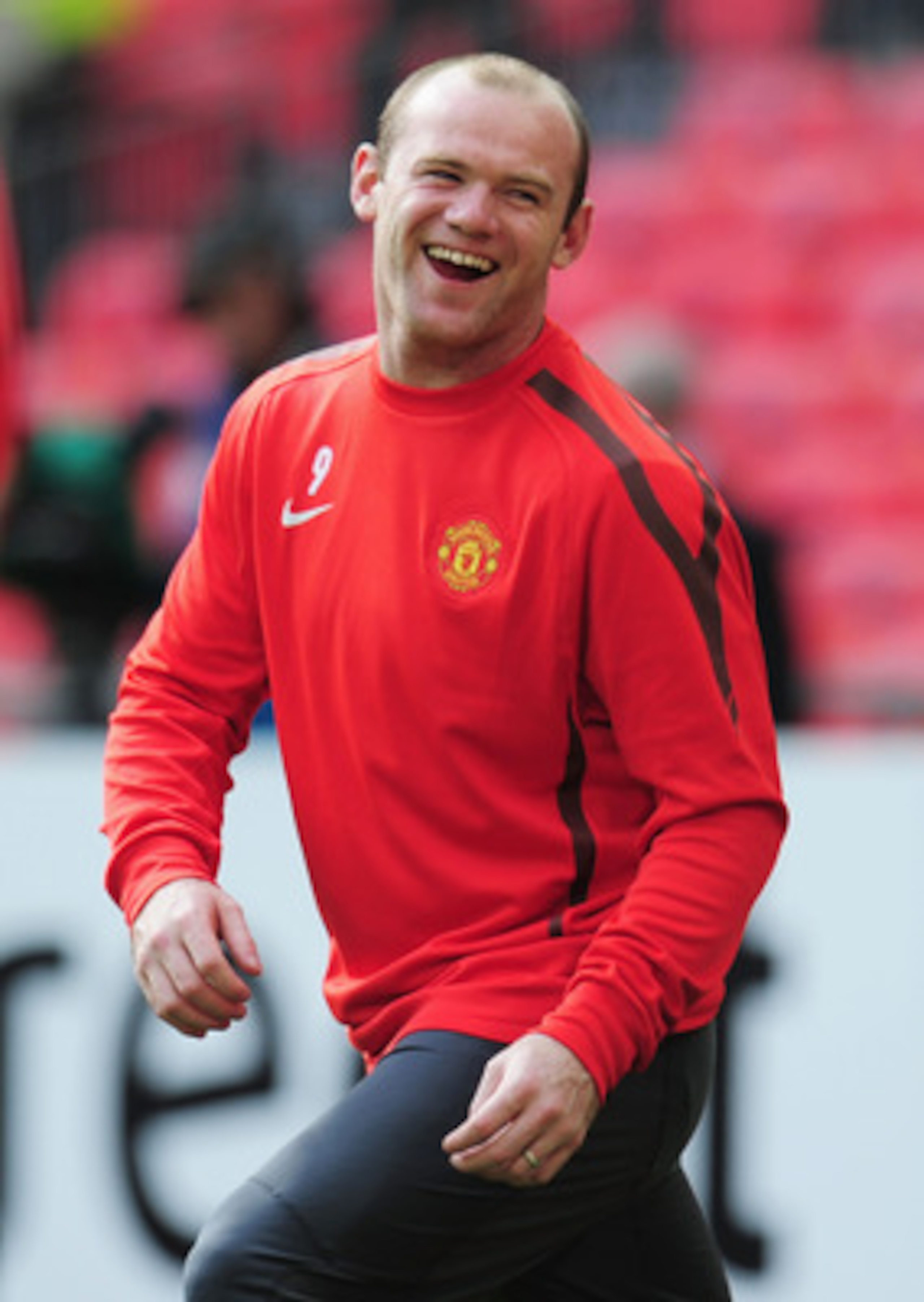 LONDON, ENGLAND - MAY 27:  Wayne Rooney of Manchetser United laughs during a Manchester United training session prior to the UEFA Champions League final versus Barcelona at Wembley Stadium on May 27, 2011 in London, England.  (Photo by Shaun Botterill/Get