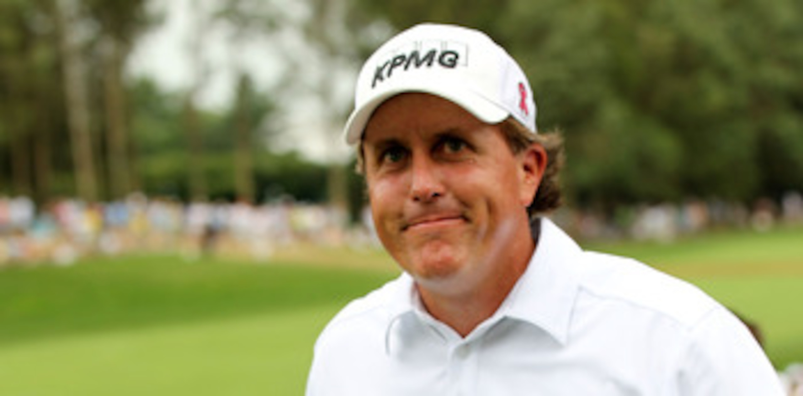 BETHESDA, MD - JUNE 18:  Phil Mickelson walks off the 18th green during the third round of the 111th U.S. Open at Congressional Country Club on June 18, 2011 in Bethesda, Maryland.  (Photo by Jamie Squire/Getty Images)