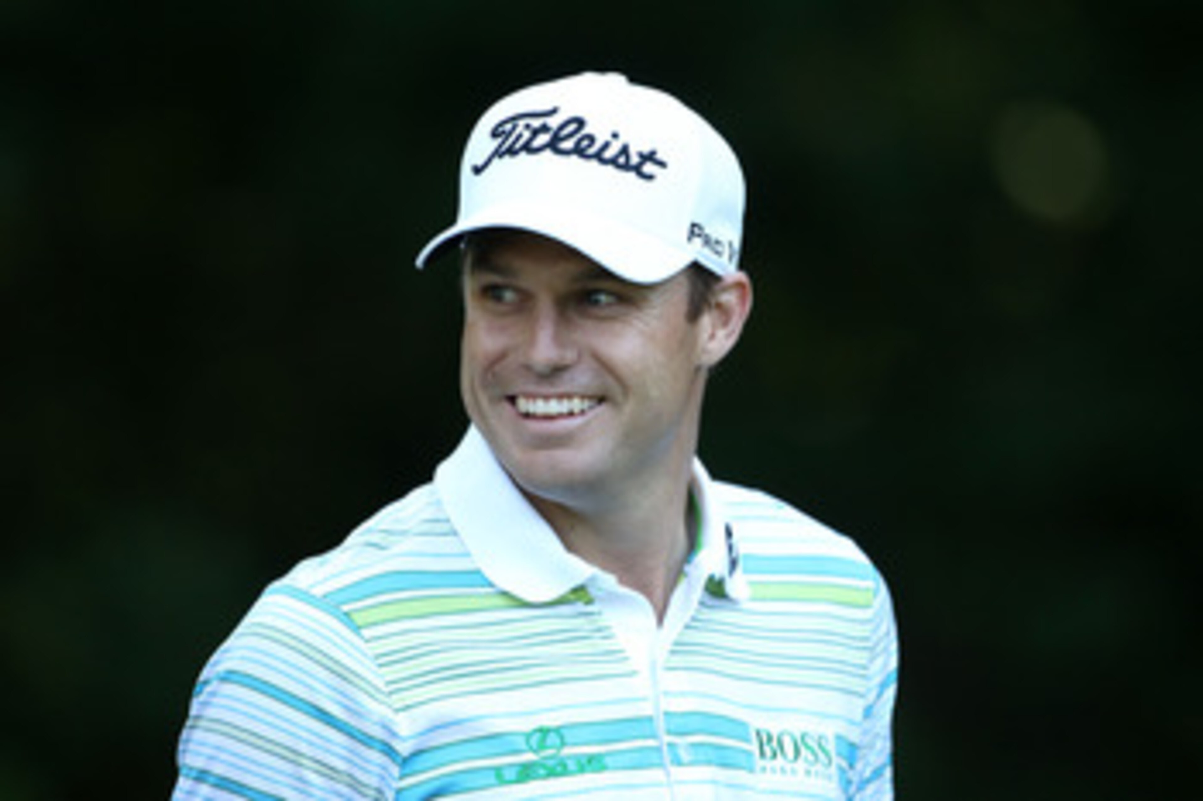 BETHESDA, MD - JUNE 15:  Nick Watney smiles as he walks off a tee box during a practice round prior to the start of the 111th U.S. Open at Congressional Country Club on June 15, 2011 in Bethesda, Maryland.  (Photo by Andrew Redington/Getty Images)