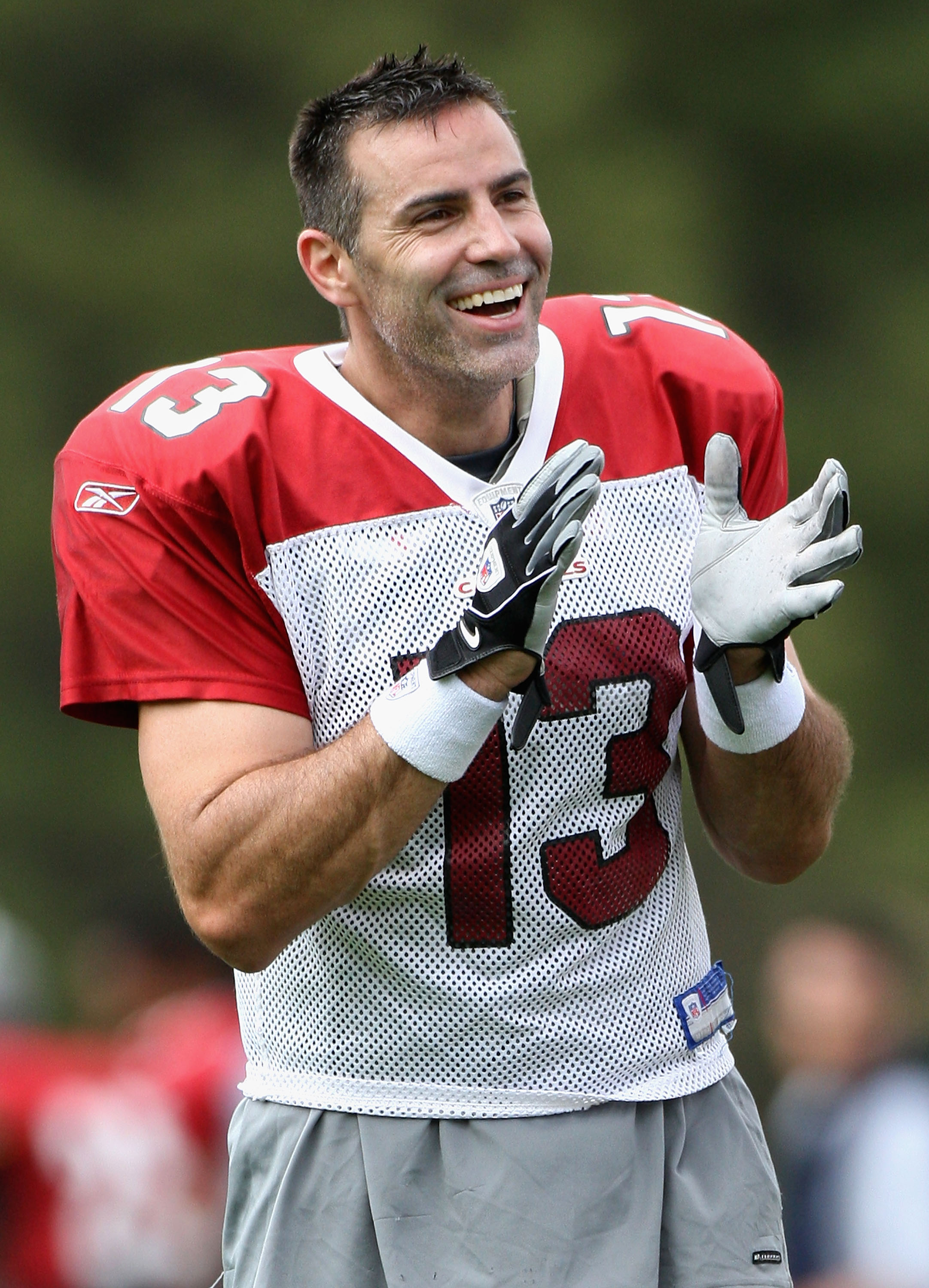 FLAGSTAFF, AZ - JULY 31: Quarterback Kurt Warner #13 of the Arizona Cardinals laughs during the evening team training camp at Northern Arizona University on July 31, 2009 in Flagstaff, Arizona. (Photo by Christian Petersen/Getty Images)