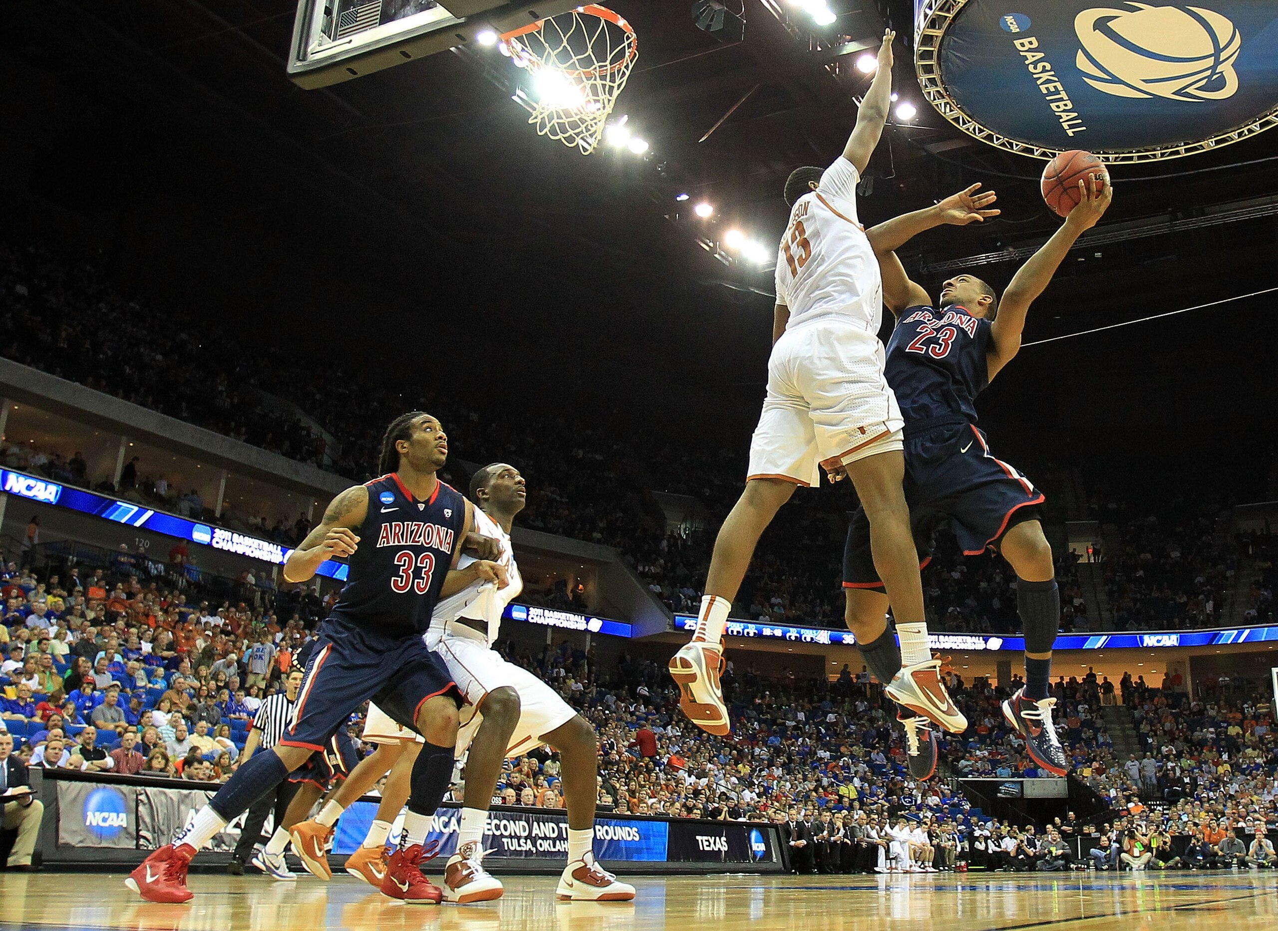 TULSA, OK - MARCH 20:  Derrick Williams #23 of the Arizona Wildcats goes up for a shot against Tristan Thompson #13 of the Texas Longhorns during the third round of the 2011 NCAA men's basketball tournament at BOK Center on March 20, 2011 in Tulsa, Oklaho