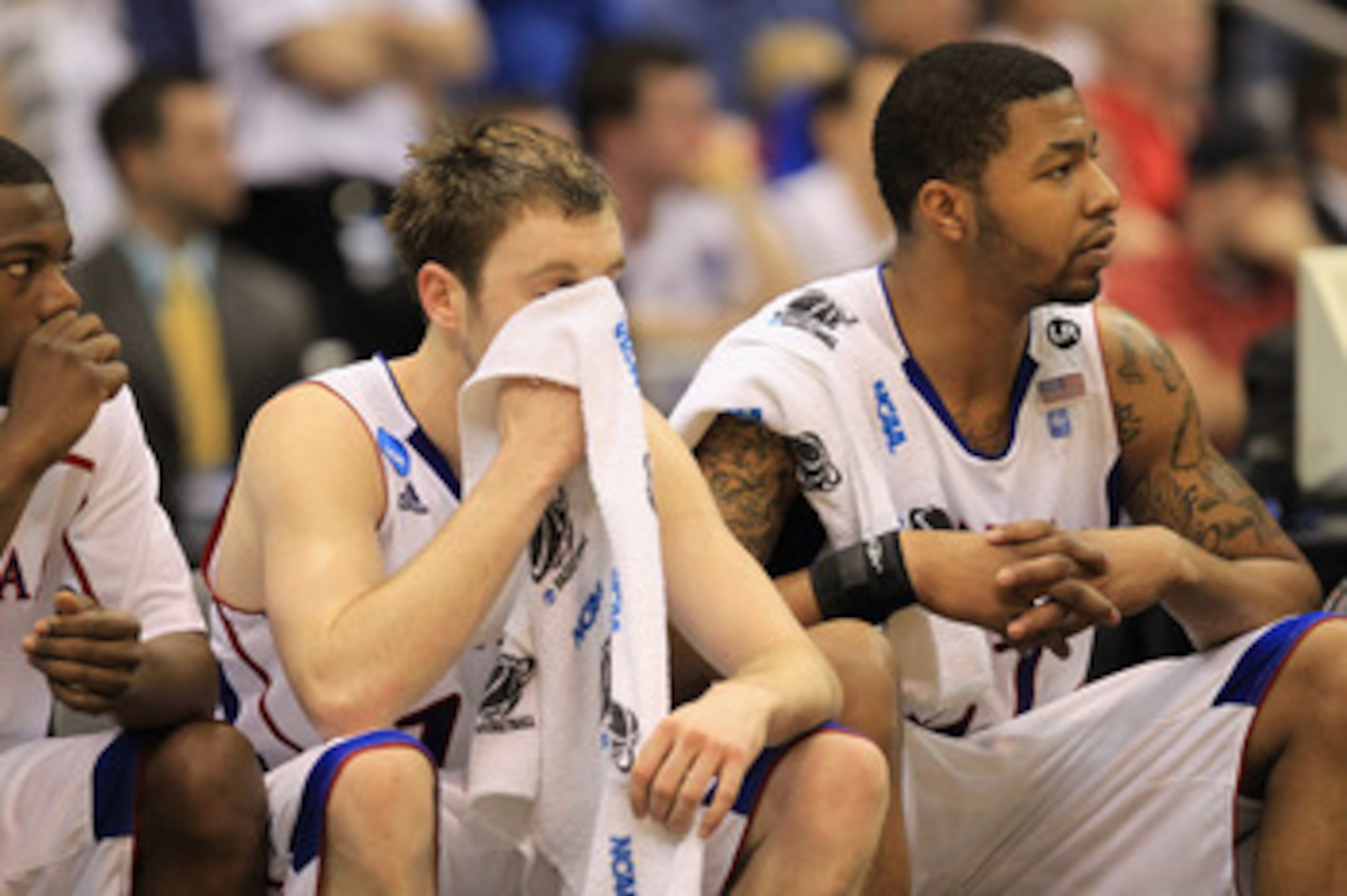 SAN ANTONIO, TX - MARCH 27:  (L-R) Brady Morningstar #12 and Markieff Morris #21 of the Kansas Jayhawks react during the southwest regional final of the 2011 NCAA men's basketball tournament against the Virginia Commonwealth Rams at the Alamodome on March