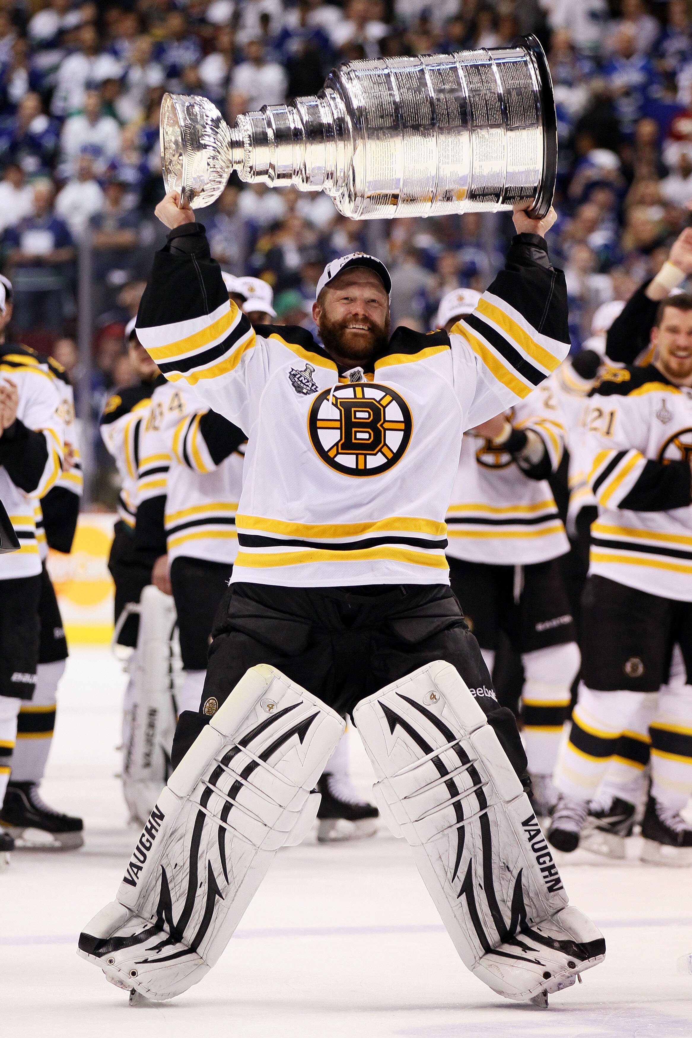 VANCOUVER, BC - JUNE 15:  Tim Thomas #30 of the Boston Bruins celebrates with the Stanley Cup after defeating the Vancouver Canucks in Game Seven of the 2011 NHL Stanley Cup Final at Rogers Arena on June 15, 2011 in Vancouver, British Columbia, Canada. Th
