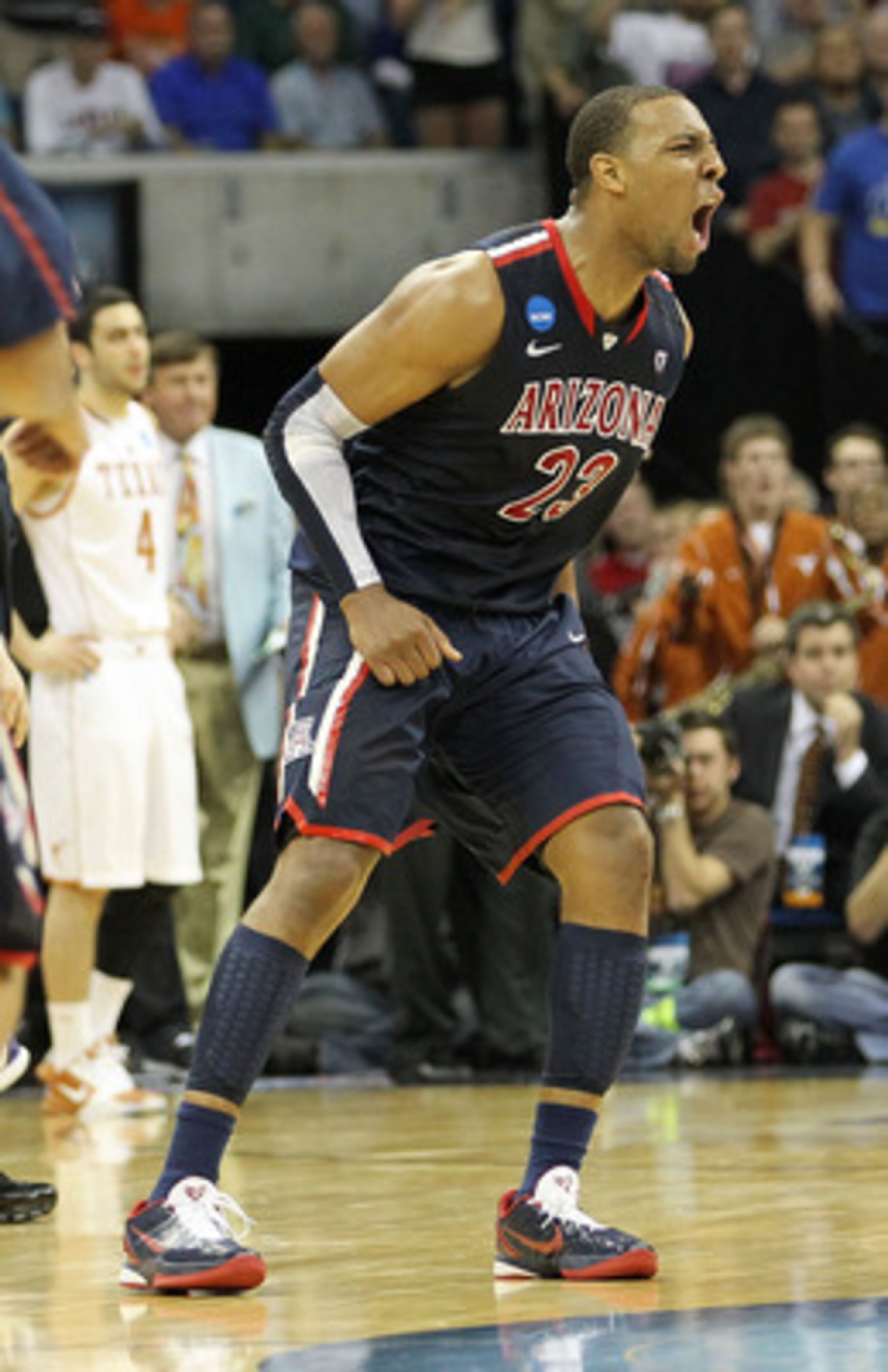 TULSA, OK - MARCH 20:  Derrick Williams #23 of the Arizona Wildcats celebrates after defeating the Texas Longhorns 70-69 in the third round of the 2011 NCAA men's basketball tournament at BOK Center on March 20, 2011 in Tulsa, Oklahoma.  (Photo by Ronald 