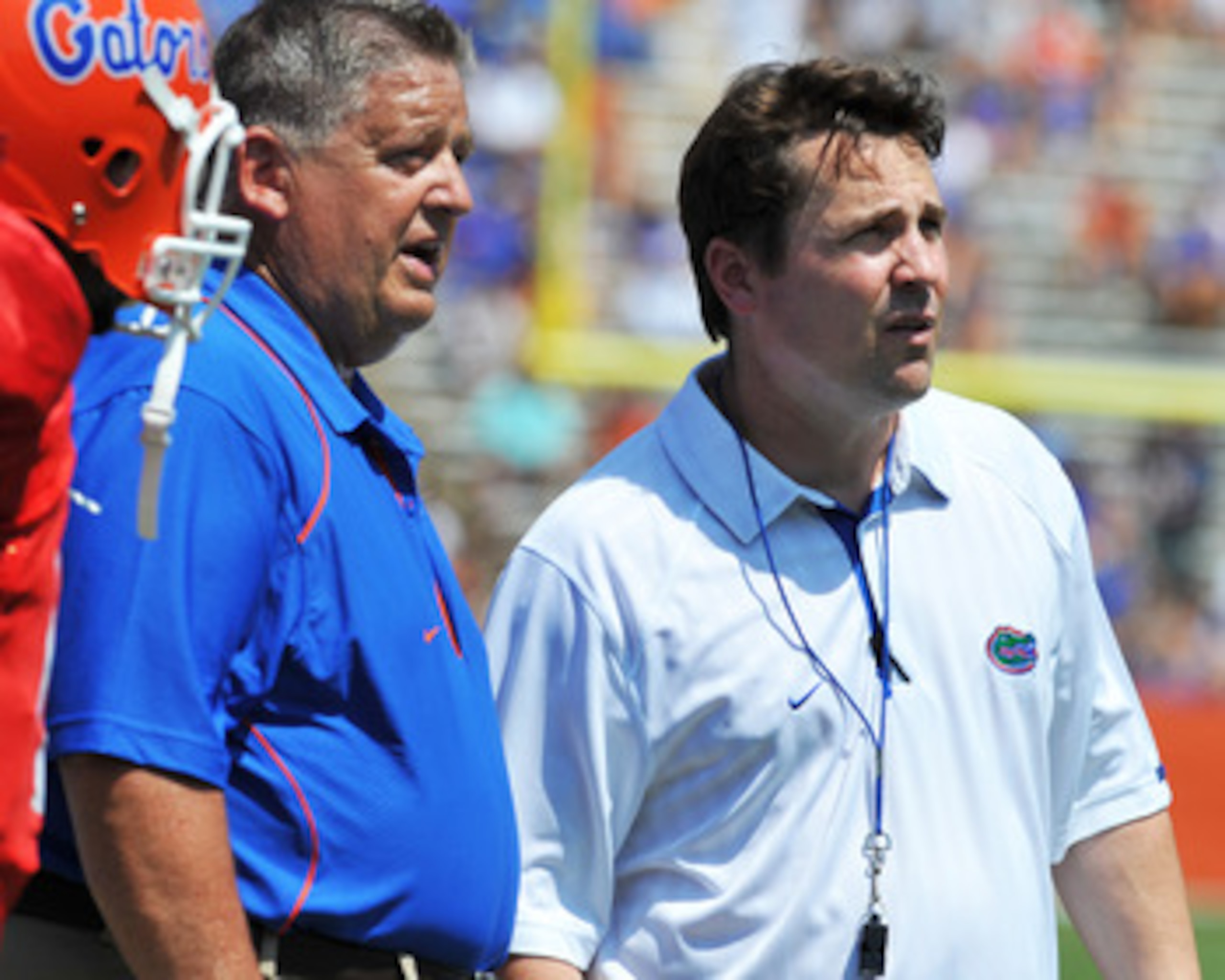 GAINESVILLE, FL - APRIL 9:  Coach Will Muschamp and offensive coordinator Charlie Weis of the Florida Gators direct play during the Orange and Blue spring football game April 9, 2010 Ben Hill Griffin Stadium in Gainesville, Florida.  (Photo by Al Messersc